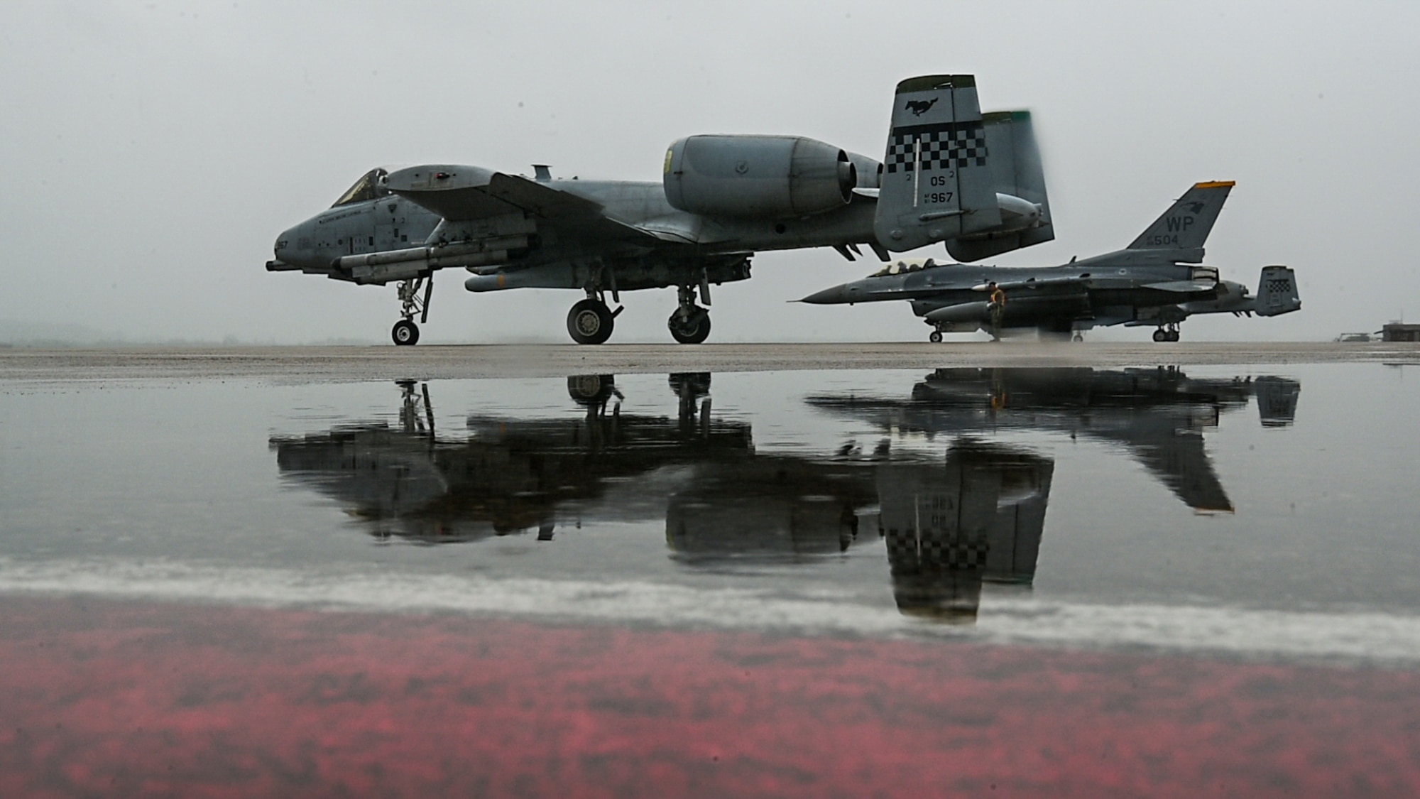 Photo of Airmen, U.S. Air Force aircraft participating in an aircraft generation training event.