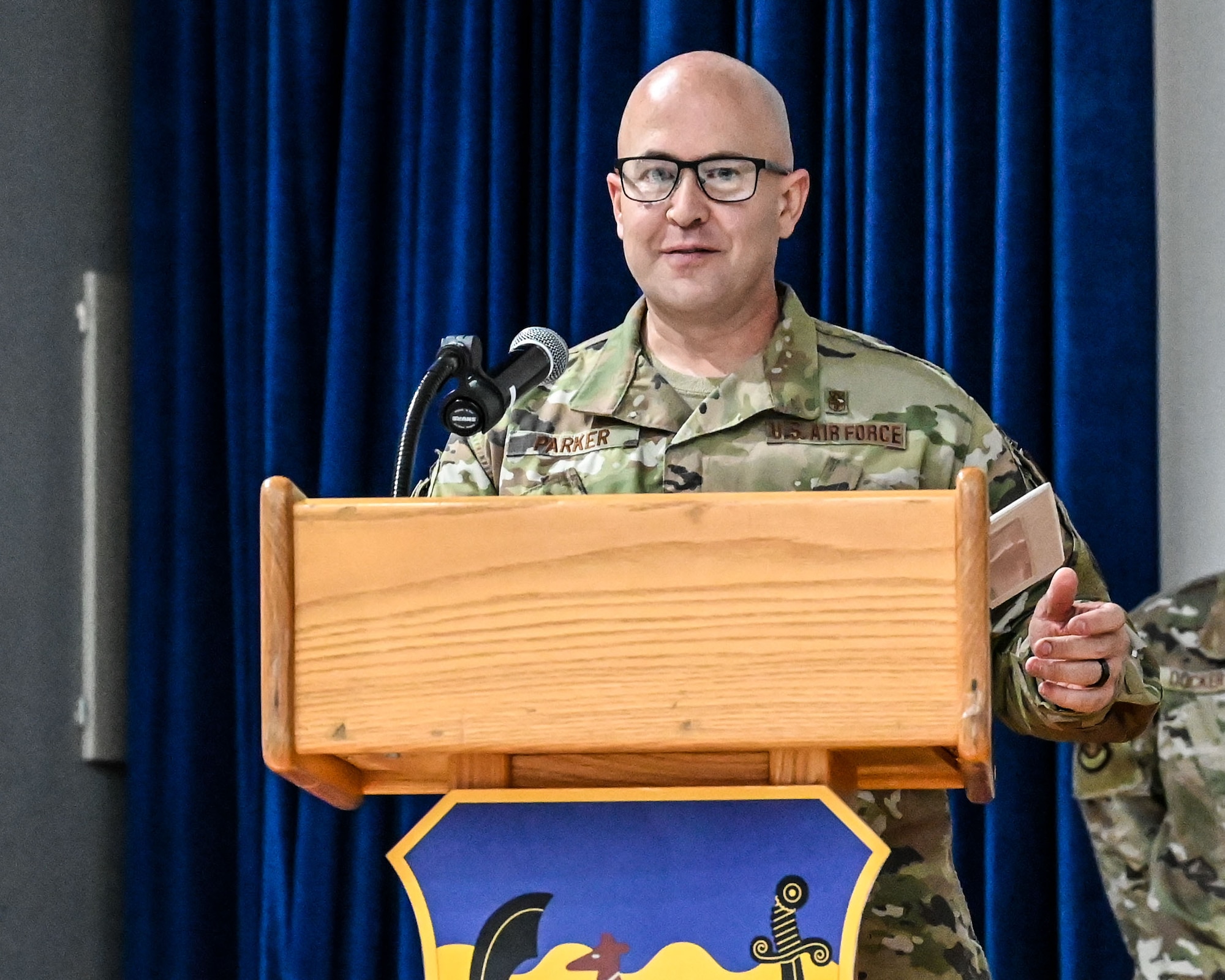 Lt. Col. Christopher Parker, 386th Expeditionary Medical Squadron commander, addresses his new squadron during a change of command ceremony at Ali Al Salem Air Base, Kuwait, May 30, 2023. Parker formally took over command of the unit from Lt. Col. John Stubbs.