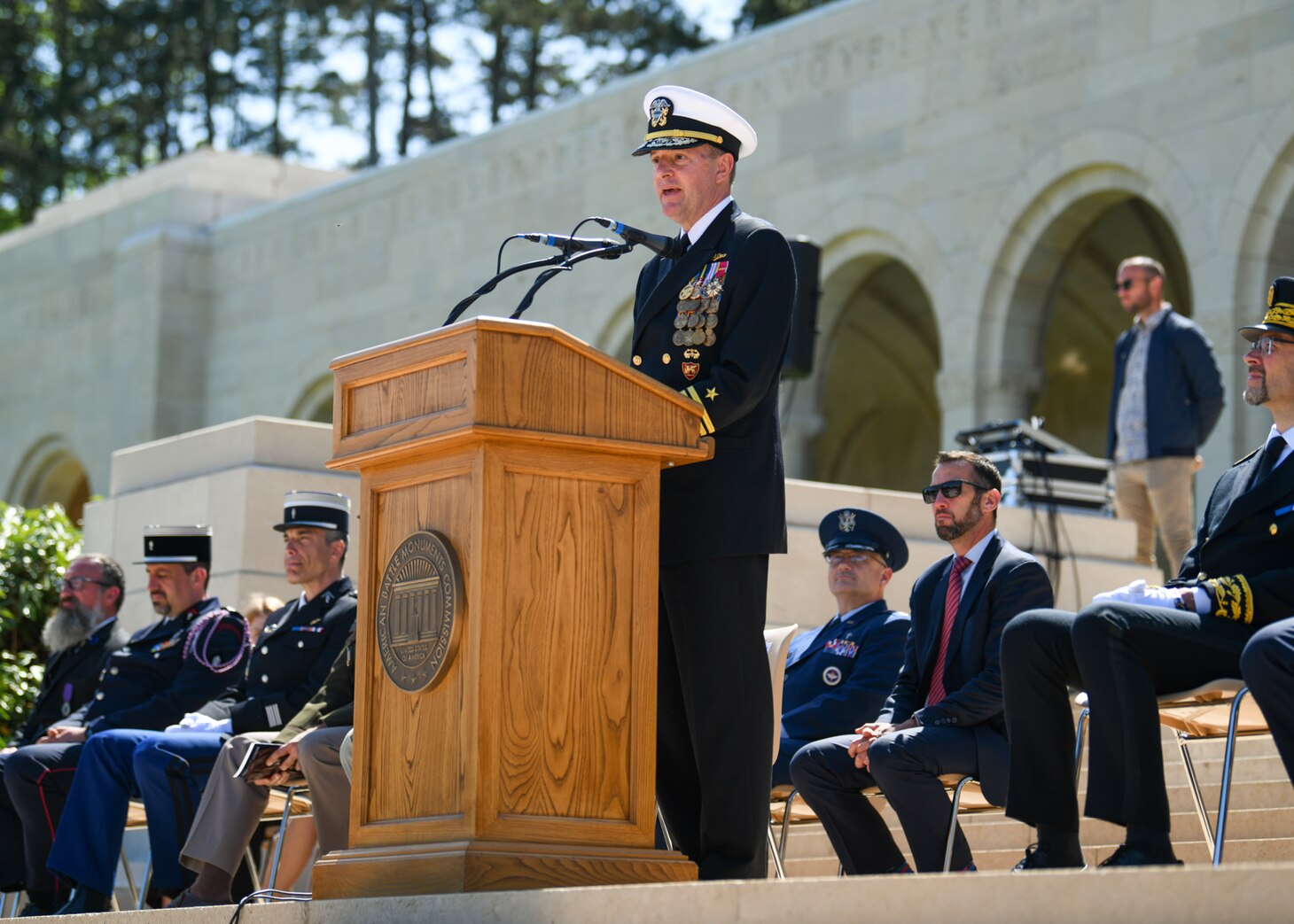 ROMAGNE-SOUS-MONTFAUCON, France (May 28, 2023) – U.S. Navy Adm. Stuart B. Munsch, commander for the U.S. Naval Forces Europe – Africa and Allied Joint Force Command Naples, provide remarks during the Meuse-Argonne American Cemetery ceremony in Romagne-sous-Montfaucon, France, May 28, 2023. Admirals from the U.S. Naval Forces Europe-Africa, U.S. Sixth Fleet, and Navy Region Europe, Africa, Central traveled throughout Europe visiting American Battle Monuments Commission cemeteries to honor the lives and legacies of fallen U.S. and Allied service members who paid the ultimate price through servicing their countries. Headquarters in Naples, Italy, NAVEUR-NAVAF operates U.S. naval forces in the U.S. European Command and U.S. Africa Command area of responsibility. U.S. Sixth Fleet is permanently assigned to NAVEUR-NAVAF and employs maritime forces through the full spectrum of joint and naval operations.