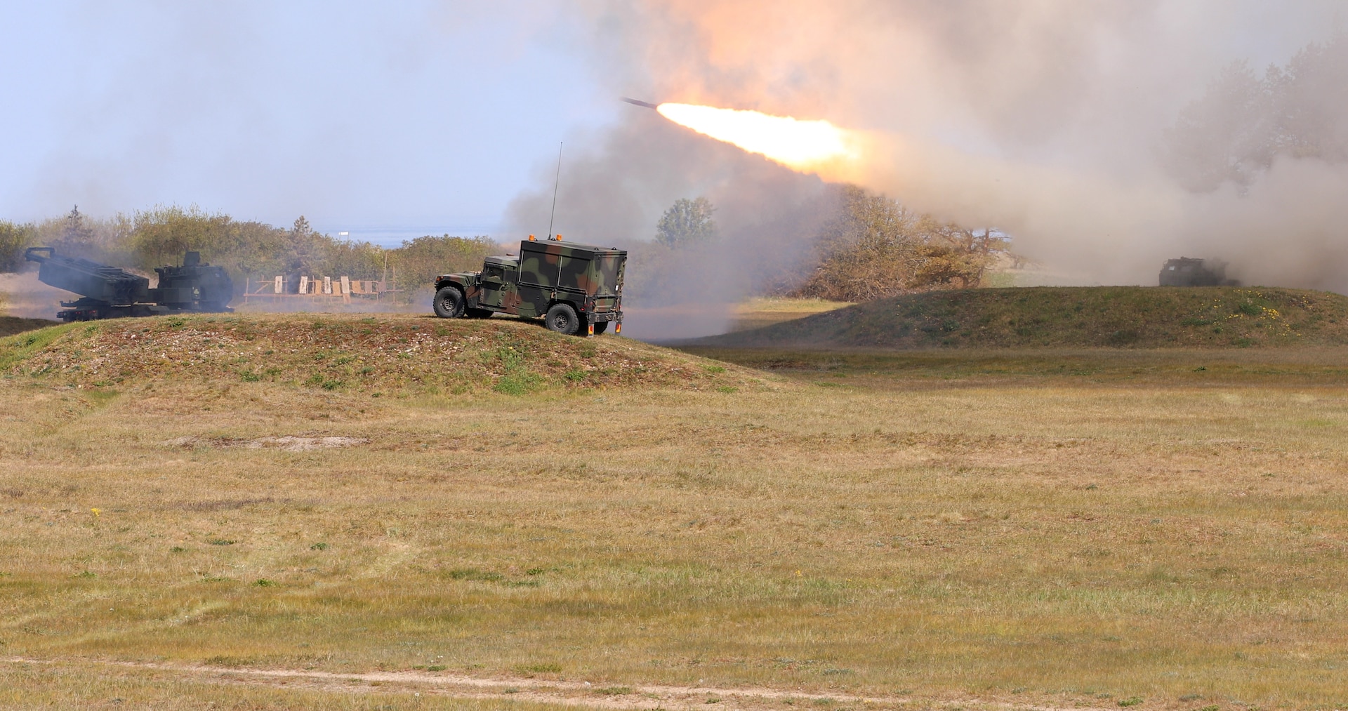 U.S. Army crew with the 1-182nd Field Artillery Regiment Michigan National Guard, fire a rocket with the M142 High Mobility Artillery Rocket System into the Baltic Sea at Skede, Latvia, May 13, 2023. The Soldiers participated in a live fire event in support of the Defender 23 exercise to build readiness and interoperability between U.S., NATO allies and partners.