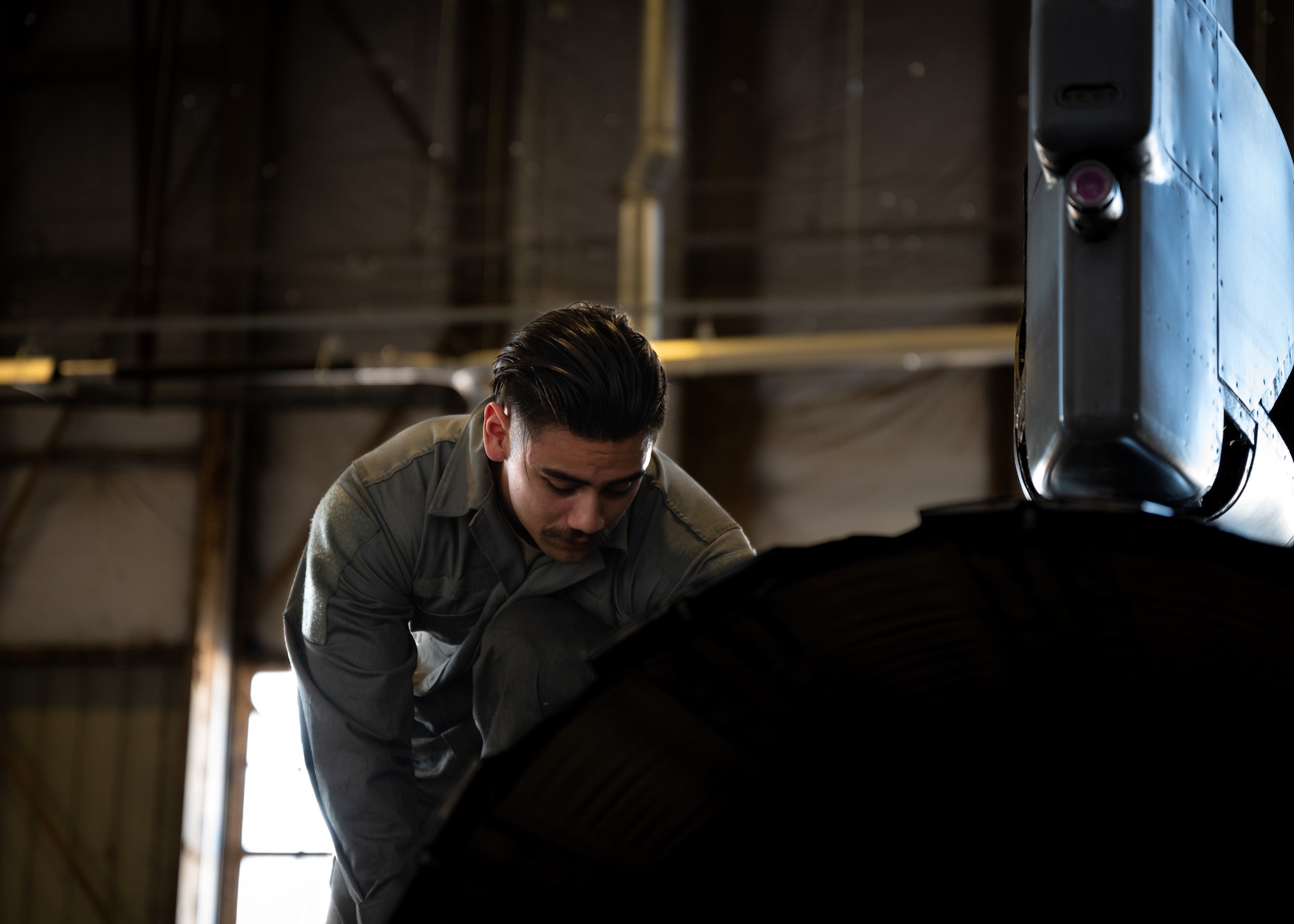 U.S. Air Force Senior Airman Ethan Estes, 55th Fighter Generation Squadron inspection section journeyman, performs routine maintenance on an F-16C Fighting Falcon that has just received 22 radar modification upgrades in conjunction with the Service Life Extension Program at Shaw Air Force Base, S.C., April 19, 2023. The APG-83 Scalable Agile Beam Radar allows the 20th FW to become a total lethal force by increasing the range of detection and weapons deployment to air-to-air and air-to-ground threats. (U.S. Air Force photo by Airman 1st Class Erin Stanley)