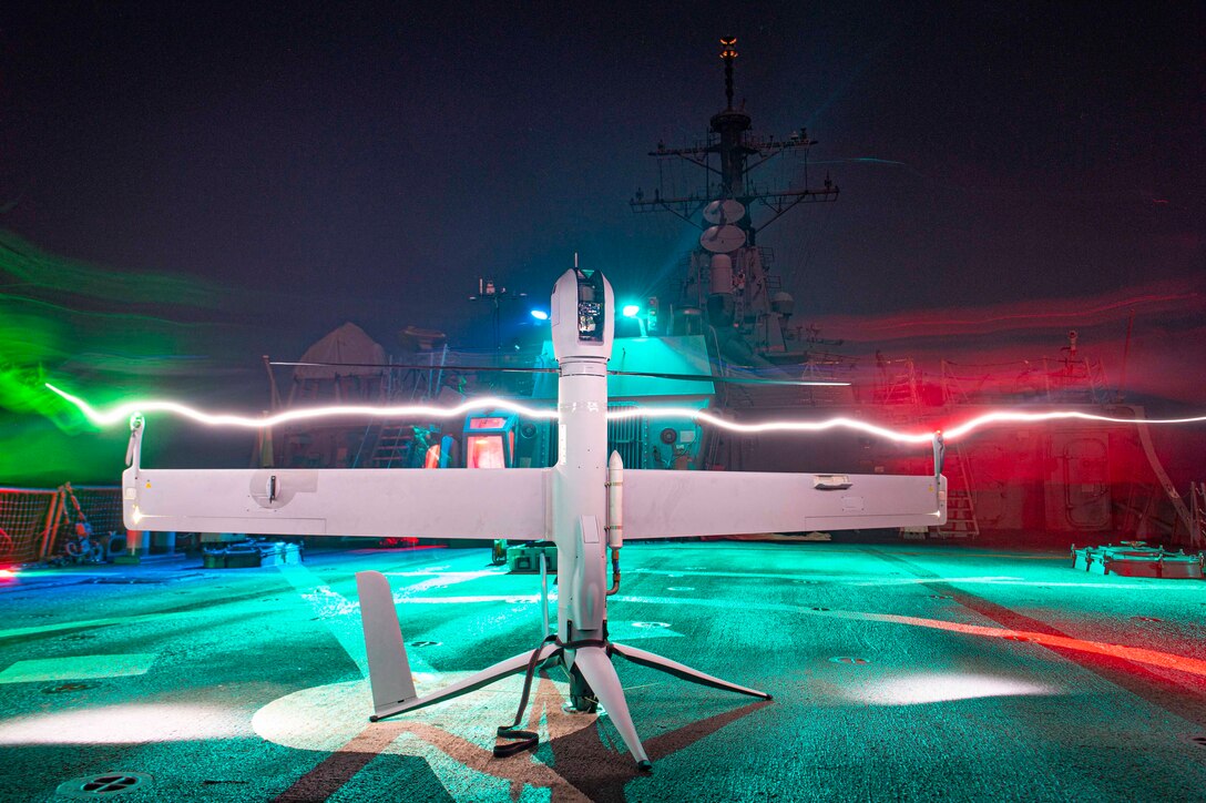 GULF OF OMAN (May 31, 2023) An Aerovel Flexrotor unmanned aerial vehicle is inspected prior to launch on the flight deck of the guided-missile destroyer USS Paul Hamilton (DDG 60) in the Gulf of Oman, May 31, 2023. Paul Hamilton is deployed to the U.S. 5th Fleet area of operations to help ensure maritime security and stability in the Middle East region. (U.S. Navy photo by Mass Communication Specialist 2nd Class Elliot Schaudt)