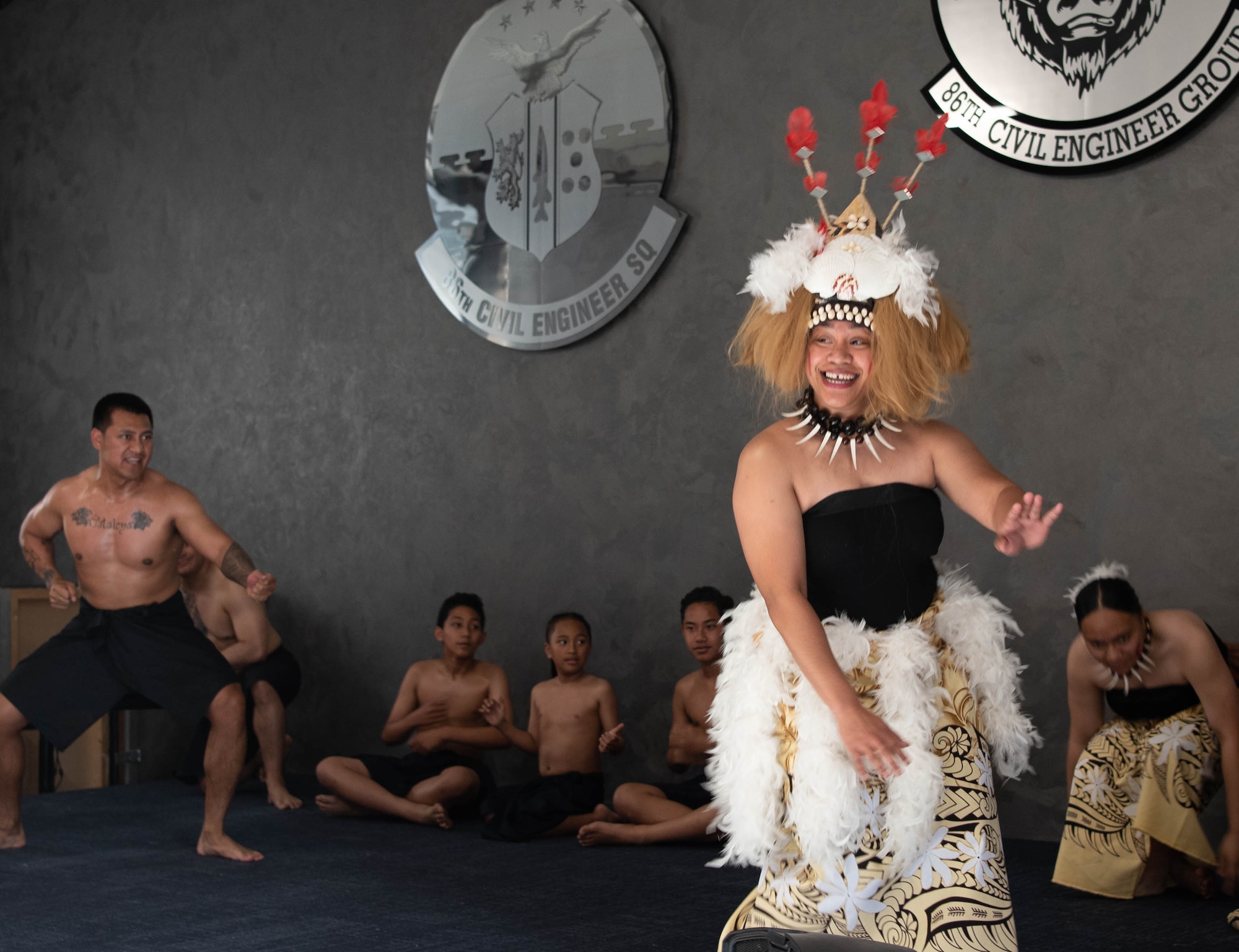 U.S. Air Force Master Sgt. Desirae Faasavalu, 786th Force Support Squadron installation personnel readiness section chief, performs a traditional Samoan dance