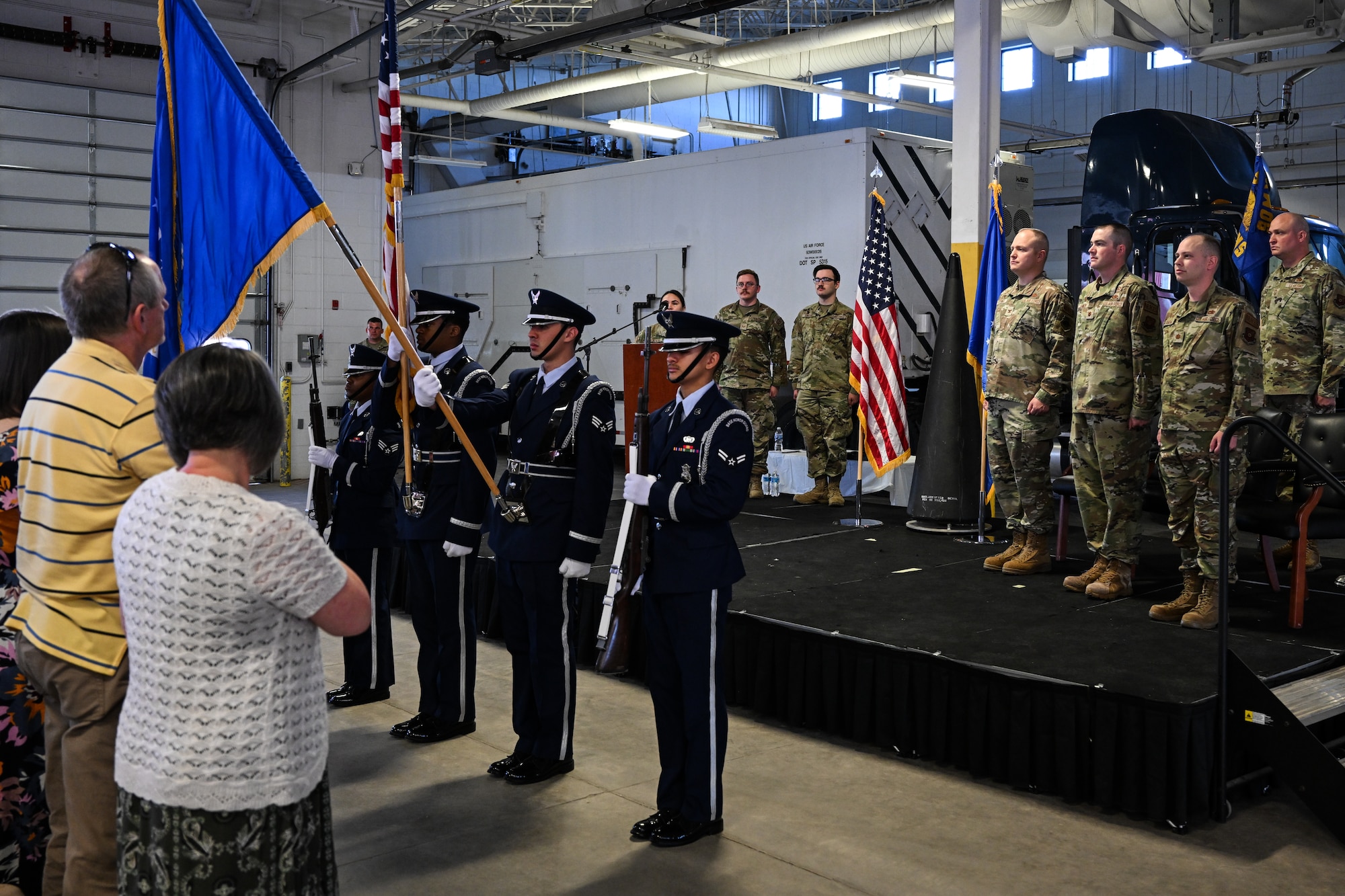 The 90th Missile Wing Color Guard post the colors during the 90th Munitions Squadron Change of Command Ceremony on F.E. Warren Air Force Base, Wyoming, May 30, 2023. A change of command represents a formal transfer of authority and responsibility from the outgoing commander to the incoming commander. (U.S. Air Force photo by Joseph Coslett Jr.)