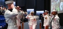 Capt. Aldrith Cobb, prior Commanding Officer of NCIS Office of Military Support, is piped ashore as she closes out her career during her retirement ceremony held at the Marine Corps Museum in Quantico, Va, May 19, 2023.