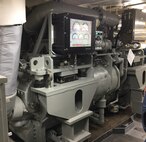 The Secretary of the Navy (SECNAV) recently recognized Naval Surface Warfare Center, Philadelphia Division (NSWCPD) with a 2022 SECNAV Energy Award in the Technology Development & Acquisition category for its High Efficiency Super-Capacity (HES-C) chiller, seen here on USS John P. Murtha (LPD 26). The HES-C chiller is currently being fielded on all new construction amphibious transport dock, destroyer (DDG), and Constellation-class frigate hulls. It is also being targeted for modernization efforts on DDG Flight (FLT) IIa and amphibious assault ship hulls during their midlife availabilities. (U.S. Navy Photo by Kevin Wiley/Released)