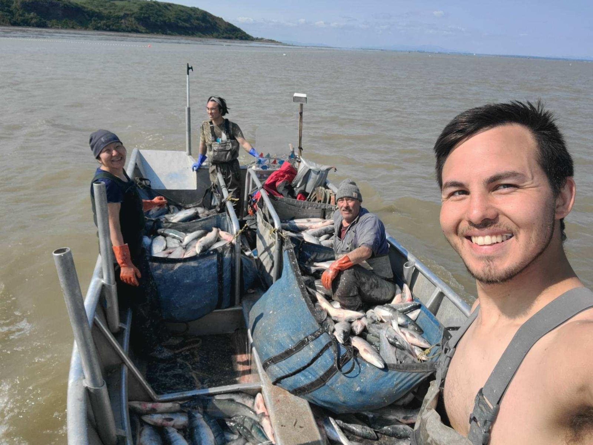 Staff Sgt. David Thurman, a crew chief with the 168th Wing, Alaska Air National Guard, and an Alaskan Commercial Fisherman, takes a selfie photo with his mother Oleaanna, brother Bobby, and Step Dad David while fishing in Alaska.