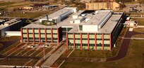 helicopter flying over buildings