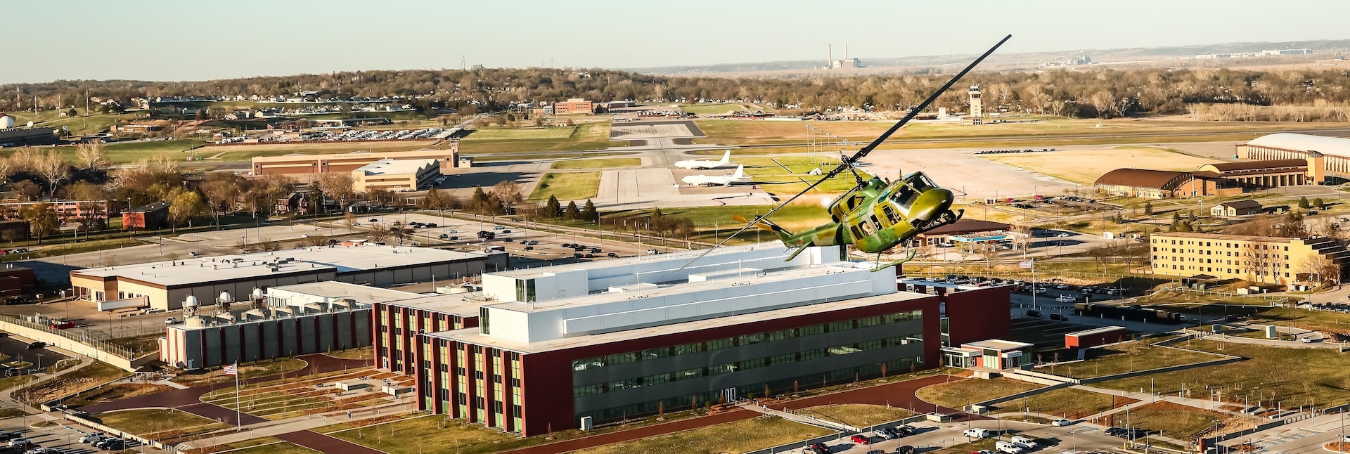 helicopter flying over military base