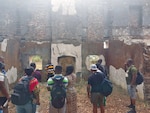 Air Force Tech Sgt. Jude Baidoo and other LEAP scholars visit Bunce Island, one of more than sixty slave trading forts established in the 1600s on the West African coast. (Courtesy photo)