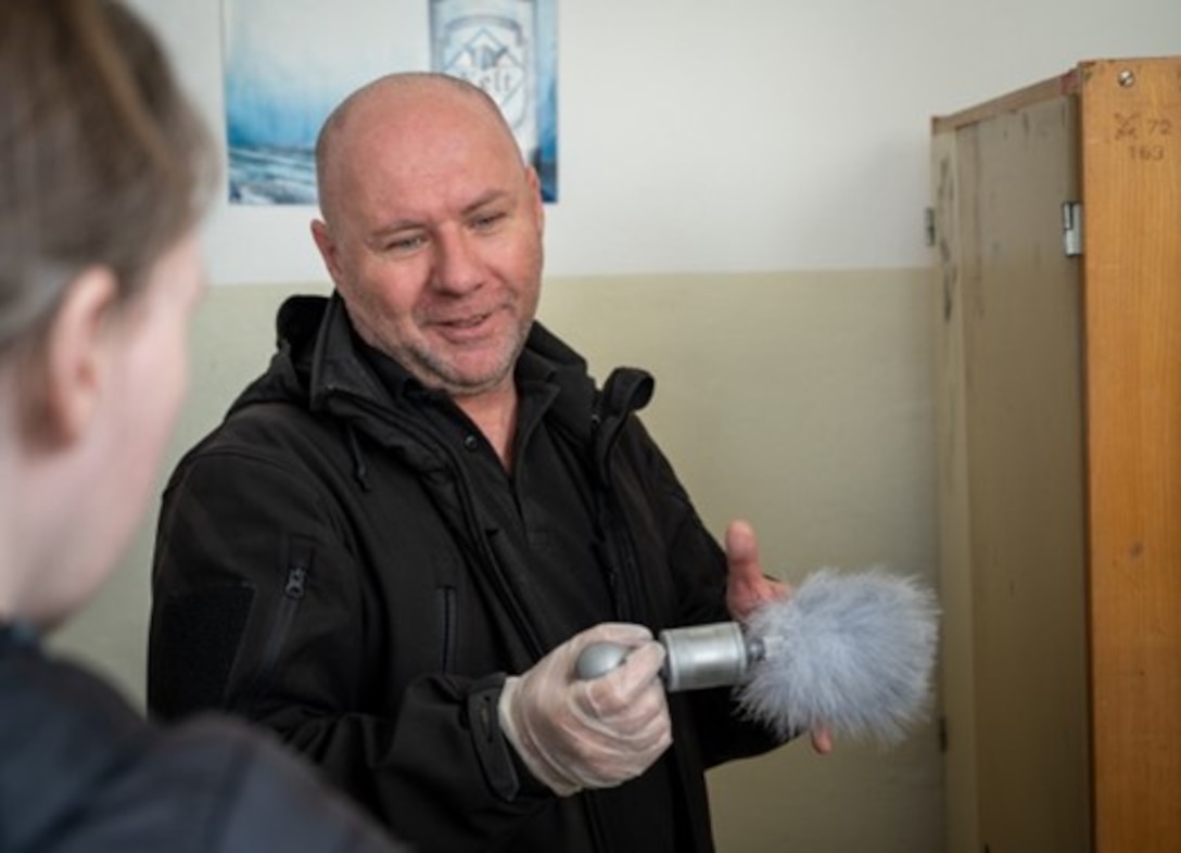 A Czech military police officer practices dusting for fingerprints during a multi-day information exchange in Hronsek, Slovakia, April 25, 2023. The information exchange involved the Office of Special Investigations and military police from Eastern European nations, such as Slovakia and the Czech Republic. (U.S. Air Force photo by Thomas Brading, OSI/PA)