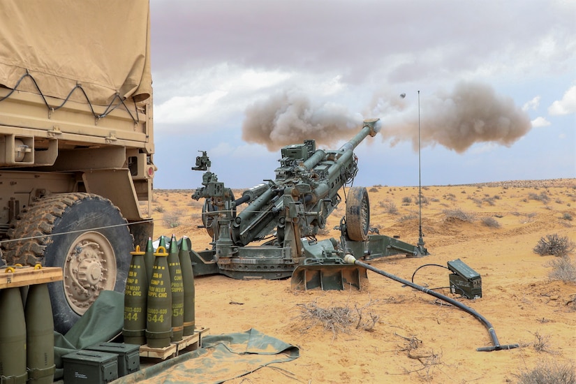 Soldiers with the 1-107th Field Artillery Regiment, 2nd Infantry Brigade Combat Team, 28th Infantry Division, Pennsylvania National Guard fire an M777 Howitzer during African Lion 23, May 27, 2023 at Ben Ghilouf Training Area, Tunisia. AL 23 provides an opportunity to conduct realistic, dynamic and collaborative readiness training in an austere environment that intersects multiple geographic and functional combatant commands including U.S. Africa Command, U.S. European Command, and U.S. Central Command. Eighteen nations and approximately 8,000 personnel will participate in African Lion 23, U.S. Africa Command's largest annual combined, joint exercise that will take place in multiple countries to include Tunisia from May 13 - June 18, 2023. (U.S. Army photo by Sgt. 1st Class Brandon Nelson)