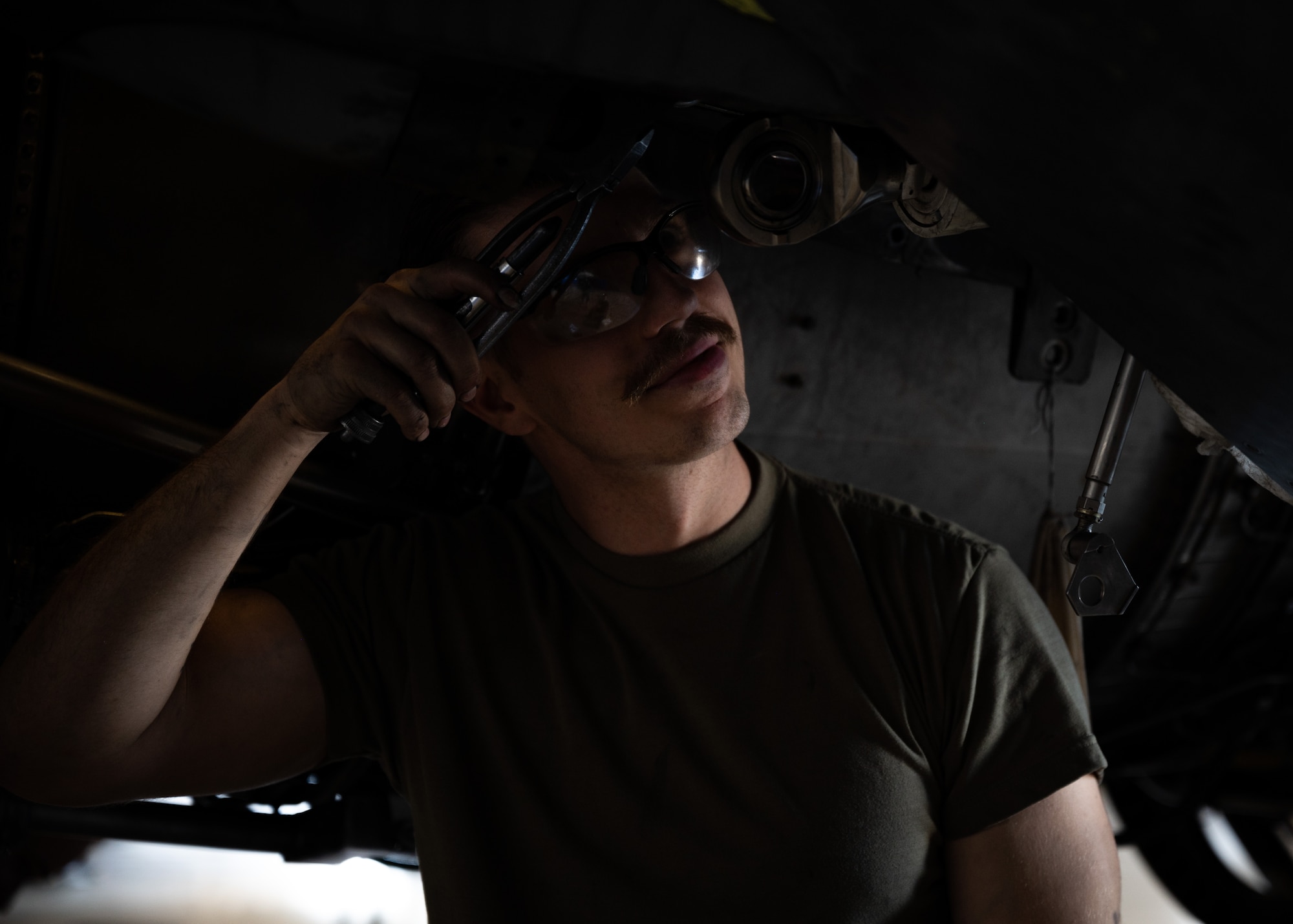 U.S. Air Force Senior Airman Austin Brown, 55th Fighter Generation Squadron inspection section journeyman, performs electrical maintenance on an F-16C Fighting Falcon upon its completion of receiving 22 radar modification upgrades at Shaw Air Force Base, S.C., April 19, 2023. 20th Fighter Wing aircraft are currently receiving mission-critical upgrades from the legacy APG-68 radar to the APG-83 Scalable Agile Beam Radar. These aircraft require routine maintenance to ensure the pilots maximize their upgraded jets’ safety and efficiency. (U.S. Air Force photo by Airman 1st Class Erin Stanley)