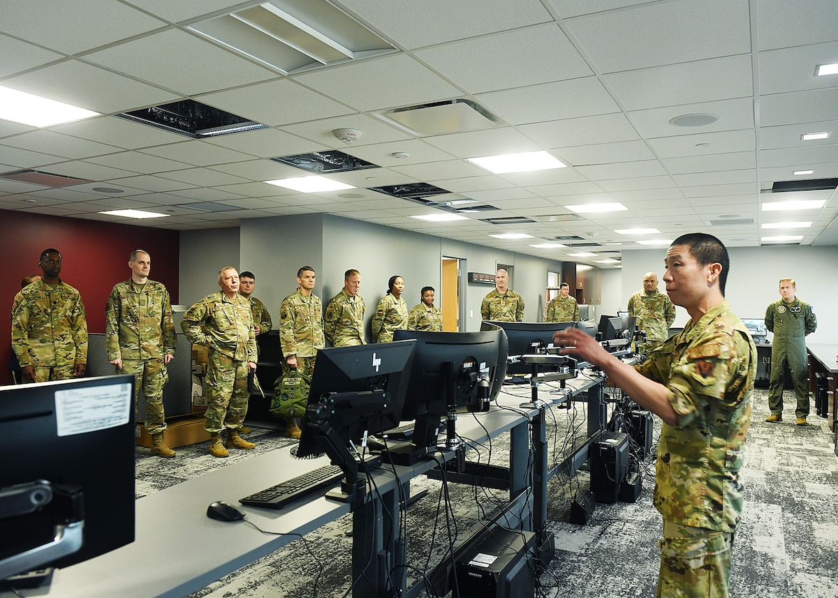 Officer speaks to other Airmen