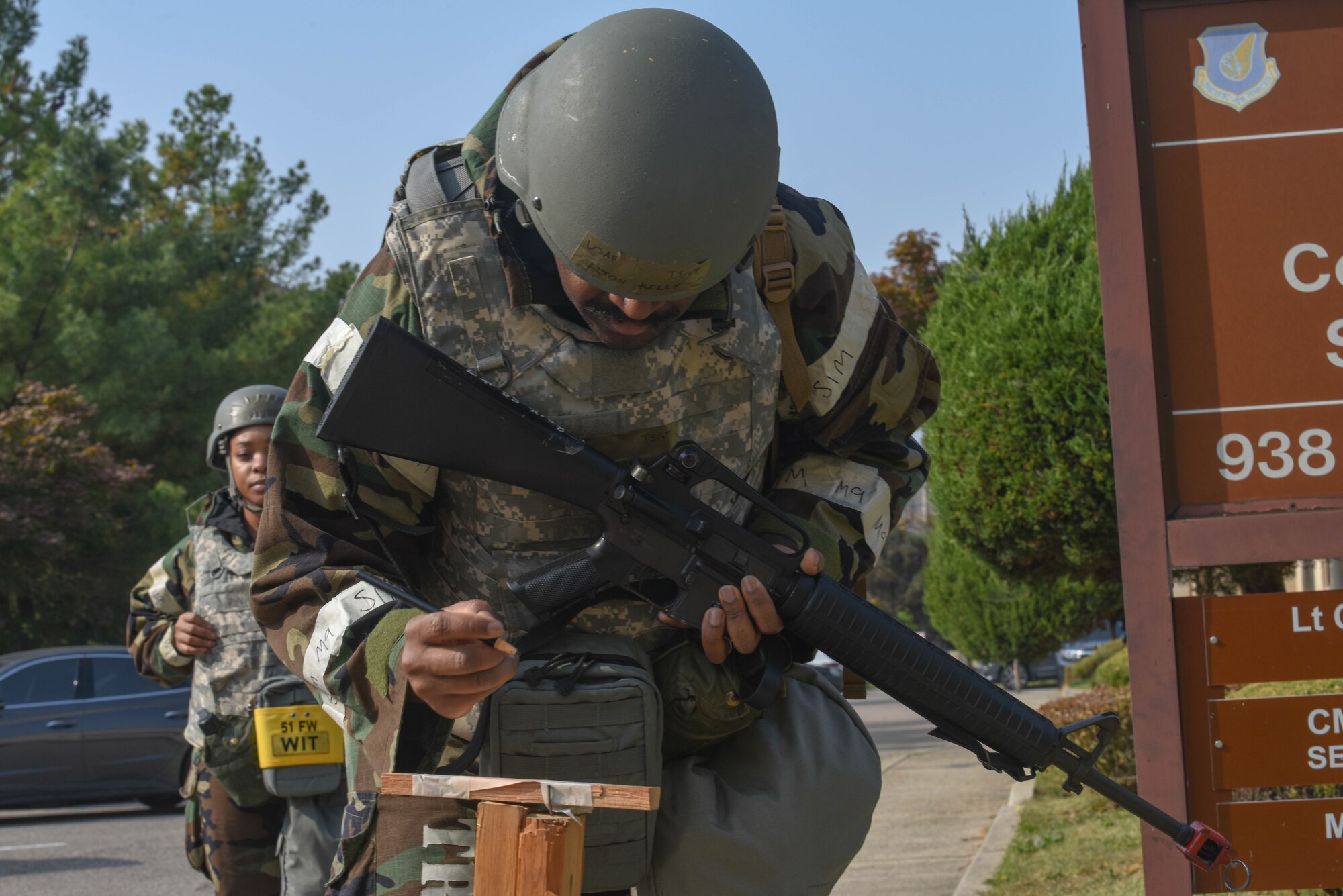 U.S. Air Force Tech. Sgt. Alton Kelly, 51st Fighter Wing post attack reconnaissance team member, left, and Master Sgt. Taylor Marcedes, 51st FW inspection team member, checks a PAR stanchion after a simulated attack during Vigilant Defense 24 at Osan Air Base, Republic of Korea, Oct. 31, 2023. The Airmen of the 51st FW are multi-capable and adaptive problem solvers, who are innovative and courageous, and demonstrate the value in diversity of thought, ingenuity, and initiative. VD24 is a routine training event that tests the military capabilities across the peninsula, allowing combined and joint training at both the operational and tactical levels. (U.S. Air Force photo by Airman 1st Class Chase Verzaal)