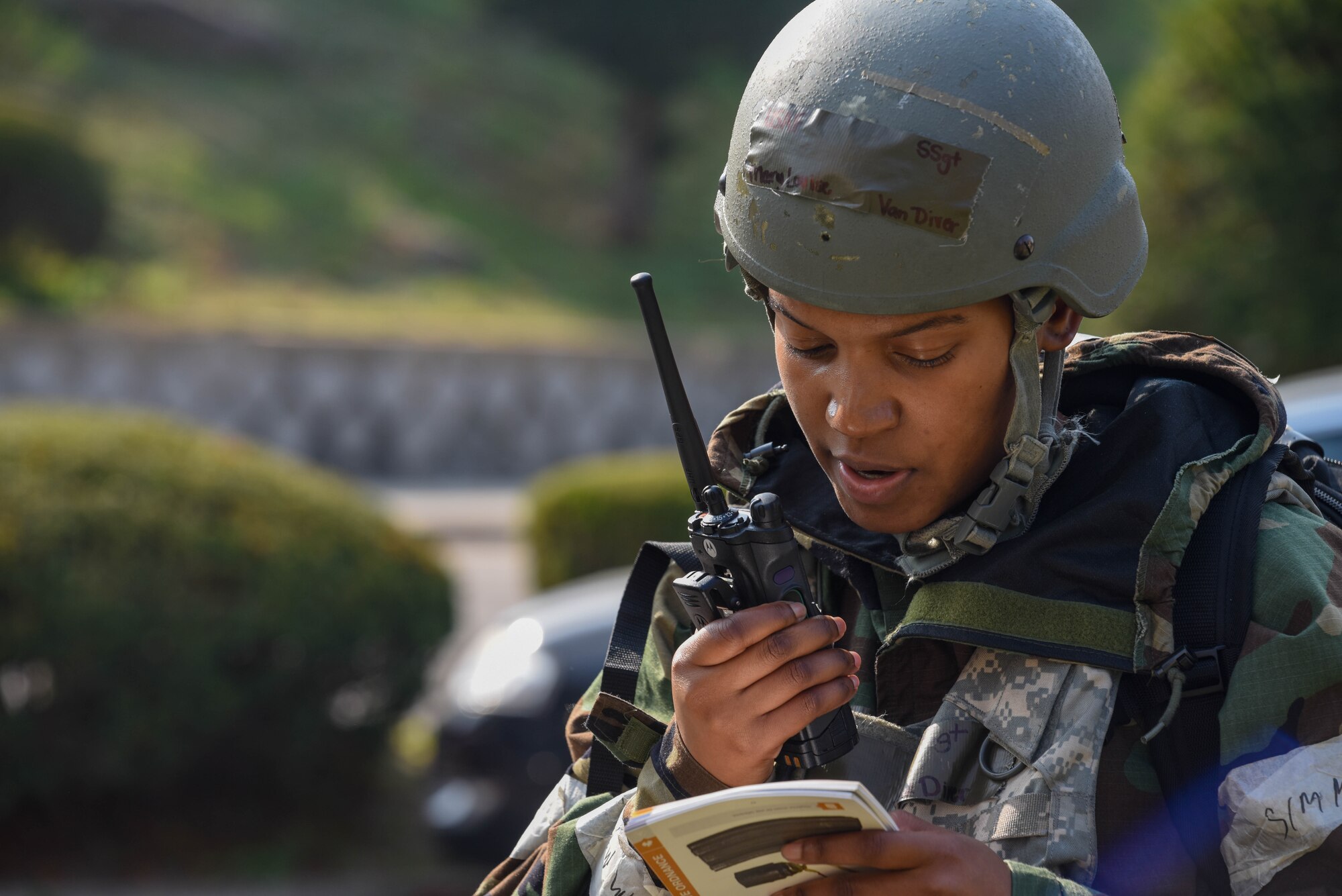 U.S. Air Force Staff Sgt. Mary Louise Van Diver, 51st Fighter Wing post attack reconnaissance team member, calls in an unexploded ordnance during Vigilant Defense 24 at Osan Air Base, Republic of Korea, Oct. 31, 2023. VD24 is a routine training event that tests the military capabilities across the peninsula, allowing combined and joint training at both the operational and tactical levels. The Airmen of the 51st FW continuously train to maintain the high level of full-spectrum readiness required to execute the mission proficiently and effectively. (U.S. Air Force photo by Airman 1st Class Chase Verzaal)