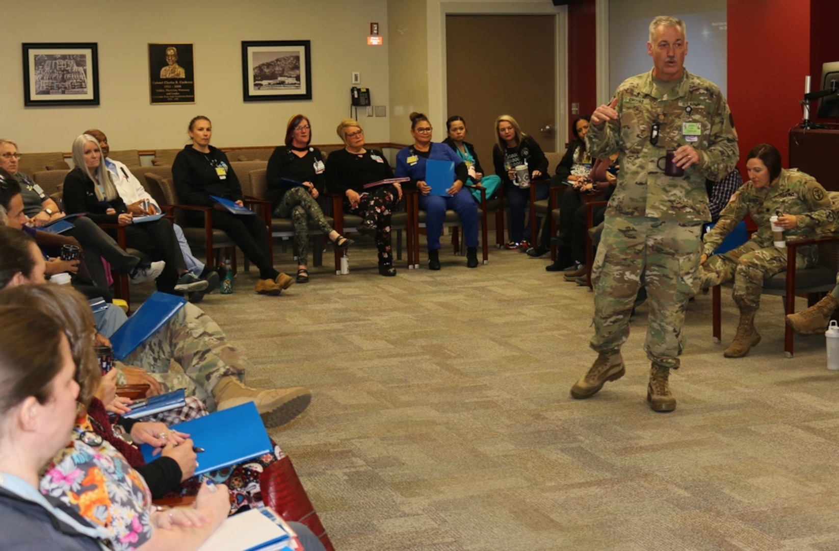 Chaplain (Maj.) Danny Crosby, chief of the Evans Army Community Hospital Department of Ministry and Pastoral Care, provides opening remarks during Evans' first Peer Support Program training for staff members Oct. 5.

The Peer Support Program, or PSP, is designed to provide a support network for clinical staff who regularly manage significant emotional stress due to involvement in an adverse event, caring for trauma victims, negative patient outcomes, or other emotional events.