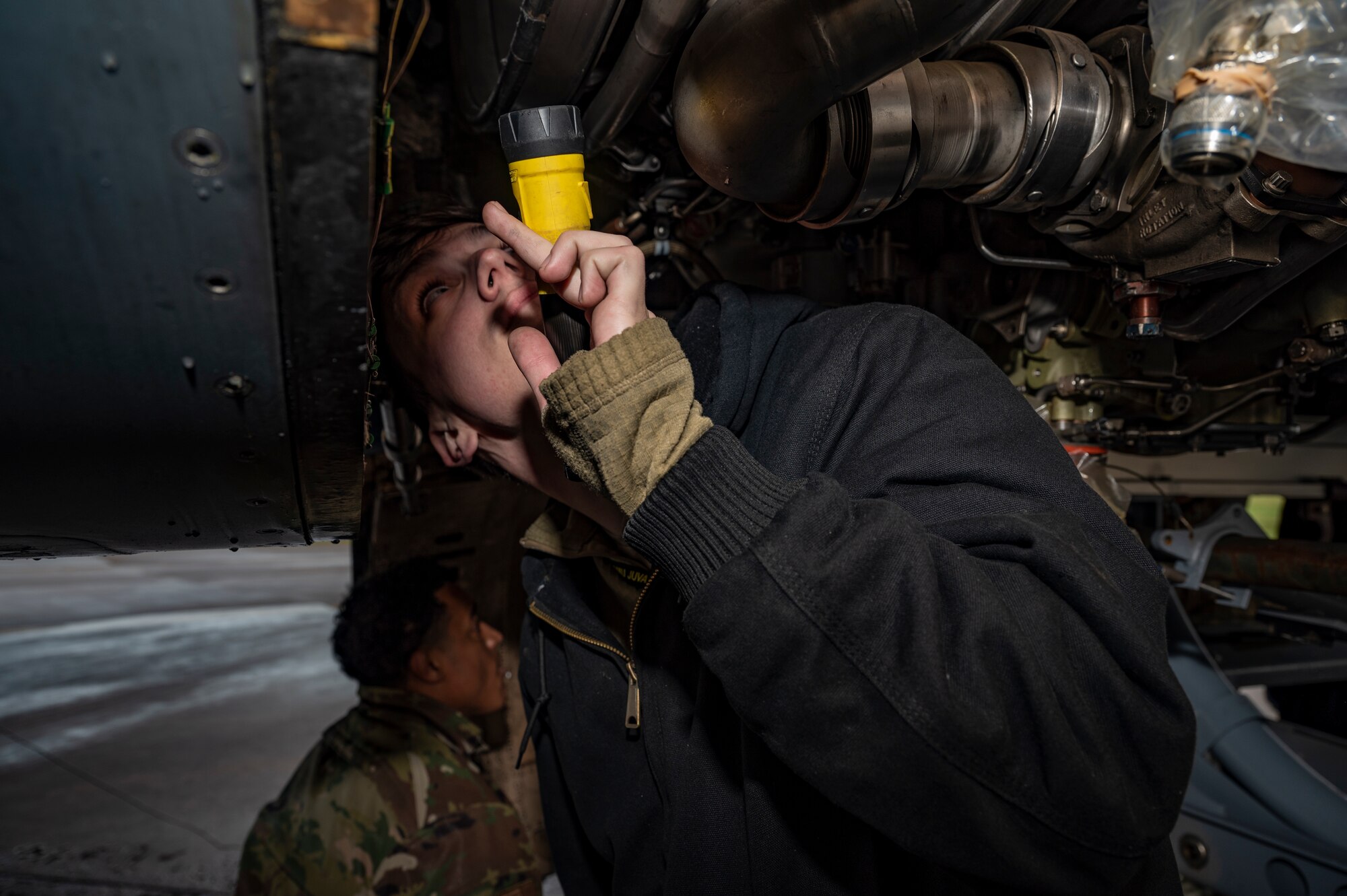 Staff Sgt. Thomas Marbut, 9th Expeditionary Bomb Squadron deployed engine manager, performs a rapid engine change at RAF Fairford, United Kingdom, Nov. 1, 2023. U.S. Air Forces in Europe routinely hosts and supports a variety of U.S. Air Force aircraft and units for training to support geographic combatant command objectives. (U.S. Air Force Photo by Senior Airman Ryan Hayman)