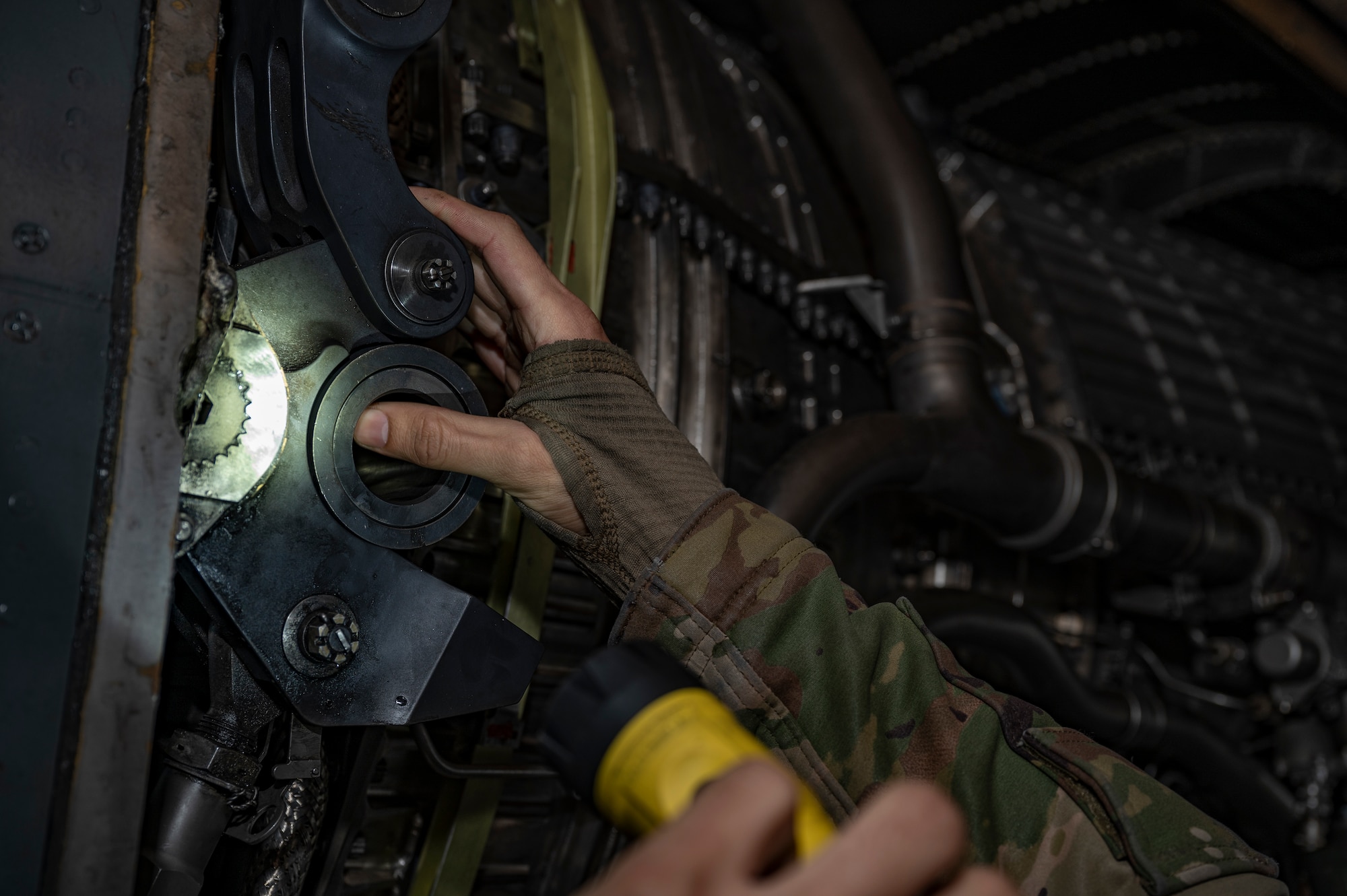 Staff Sgt. Michael Souquette, 9th Expeditionary Bomb Squadron jet engine NCO in charge, performs a rapid engine change at RAF Fairford, United Kingdom, Nov. 1, 2023. Our ability to quickly respond and assure Allies and Partners rests upon the fact that we are here, in Europe, forward and ready. (U.S. Air Force Photo by Senior Airman Ryan Hayman)