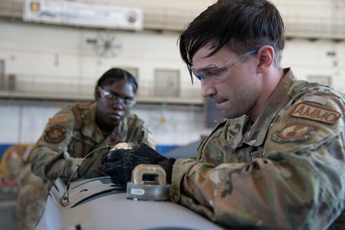 An ammo team race to build a GBU-31.
