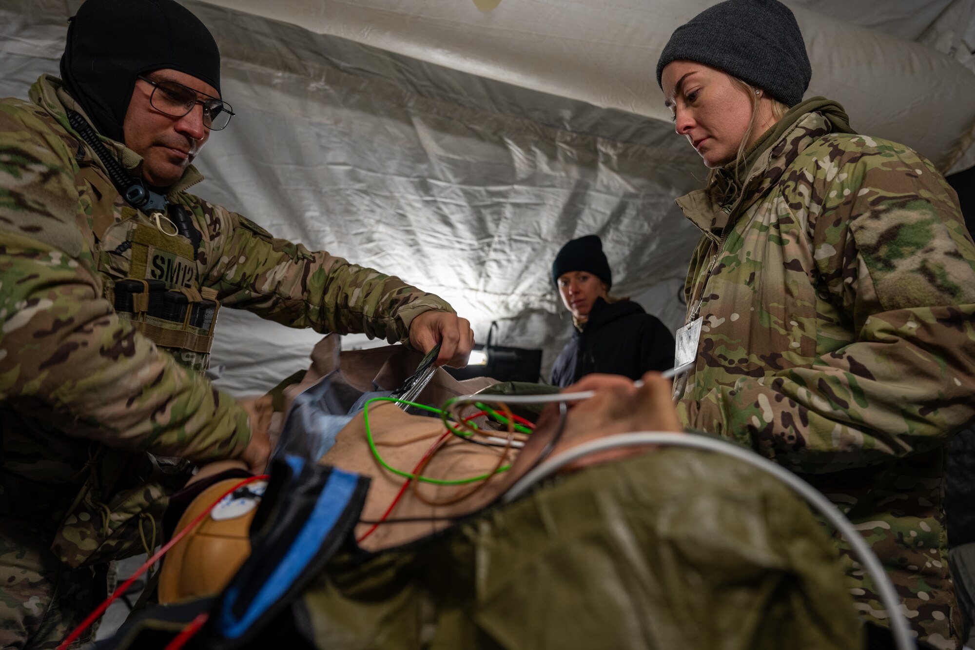 Airmen from Hurlburt Field assigned to 1st Special Operations Support Squadron participate with the Mission Sustainment Team in a two-day cold weather training at the Mckinley Climatic Lab at Eglin Air Force Base, Florida, Oct 19, 2023. Medics from 1 SOSS practiced prolonged casualty care in cold weather environments. (U.S. Air Force photo by Airman 1st Class Hussein Enaya)