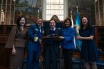 The U.S. Coast Guard Academy recognized Dr. James Chao as the first recipient of the newly established Scientæ Cedit Mare Award in New London, 27 Oct. 2023. Dr. Chao accepted the award with his family, the Honorable Elaine Chao, her sisters May and Angela, and grandson James. (Coast Guard photograph by Petty Officer 3rd Class Matt Thieme)