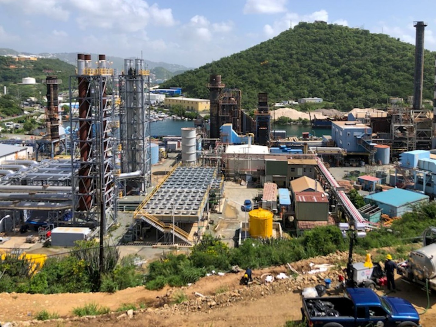 Coast Guard continues oversight of ongoing response efforts at the Virgin Islands Water and Power Authority (WAPA) Randolph Harley Power Plant in St. Thomas, Nov. 1, 2023, following a diesel spill at the facility, Oct. 25, 2023. As of the morning of Nov. 1, 2023, oil recovery crews have collected 18,000 gallons of diesel and water from the discharge tank’s secondary containment and an additional 8,000 gallons of diesel and water have been collected from the affected land outside the secondary containment. (Courtesy photo)
