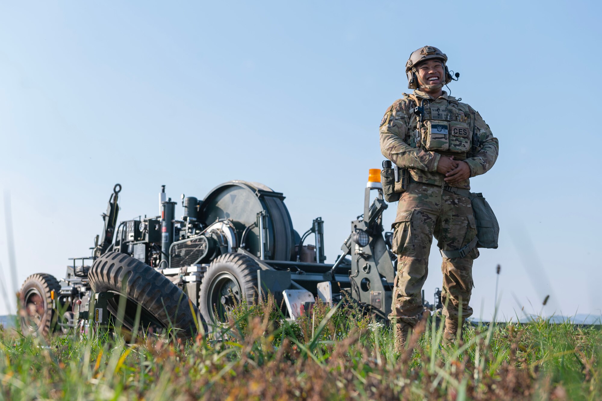 U.S. Air Force Staff Sgt. Julyon Moton, 51st Civil Engineer Squadron barrier maintenance non-commissioned officer in charge, prepares for a F-16 Fighting Falcon to utilize an alternate landing strip during Vigilant Defense 24 at Osan Air Base, Republic of Korea, Oct. 29, 2023. In contingency environments, the ALS is activated when the main runway sustains heavy damage, which allows pilots to maintain readiness and continue flying operations. VD24 is a routine training event that tests the military capabilities across the peninsula, allowing combined and joint training at both the operational and tactical levels. (U.S. Air Force photo by Staff Sgt. Aubree Owens)