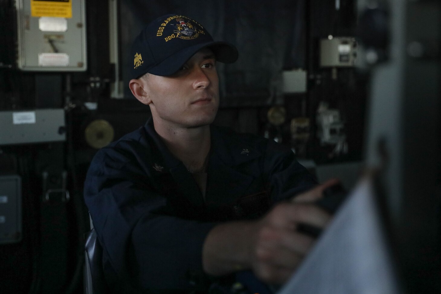 231102-N-CV021-1071 TAIWAN STRAIT (Nov. 2, 2023) Gunner’s Mate 3rd Class Stephen Forrest, from Knoxville, Tennessee, stands watch on the bridge aboard the Arleigh Burke-class guided-missile destroyer USS Rafael Peralta (DDG 115) in the Taiwan Strait, Nov. 2. Rafael Peralta is forward-deployed and assigned to Commander, Task Force 71/Destroyer Squadron (DESRON) 15, the Navy’s largest DESRON and the U.S. 7th Fleet’s principal surface force. (U.S. Navy photo by Mass Communication Specialist 3rd Class Alexandria Esteban)