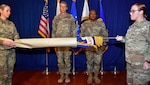 Army Gen. Daniel Hokanson, chief of the National Guard Bureau, presents the positional colors to Senior Enlisted Advisor Tony Whitehead at Joint Base Myer-Henderson Hall, Va., Nov. 1, 2023. This marks the first time a senior enlisted advisor to the National Guard chief is recognized with such colors, a milestone in a tradition that dates to 1636.