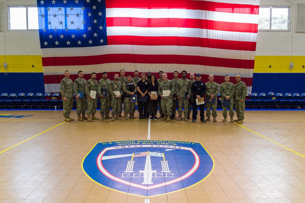 Sailors and personnel assigned to Naval Support Activity Souda Bay, Greece, receive awards and recognitions from Capt. Odin J. Klug, commanding officer, NSA Souda Bay, during an awards ceremony on Nov. 2, 2023.