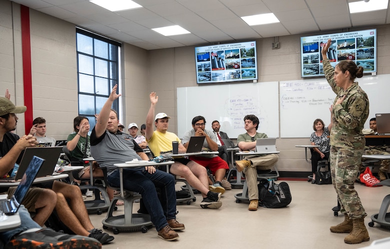 Col. L. Reyn Mann speaks with senior engineering students at University of Louisville's J.B. Speed School