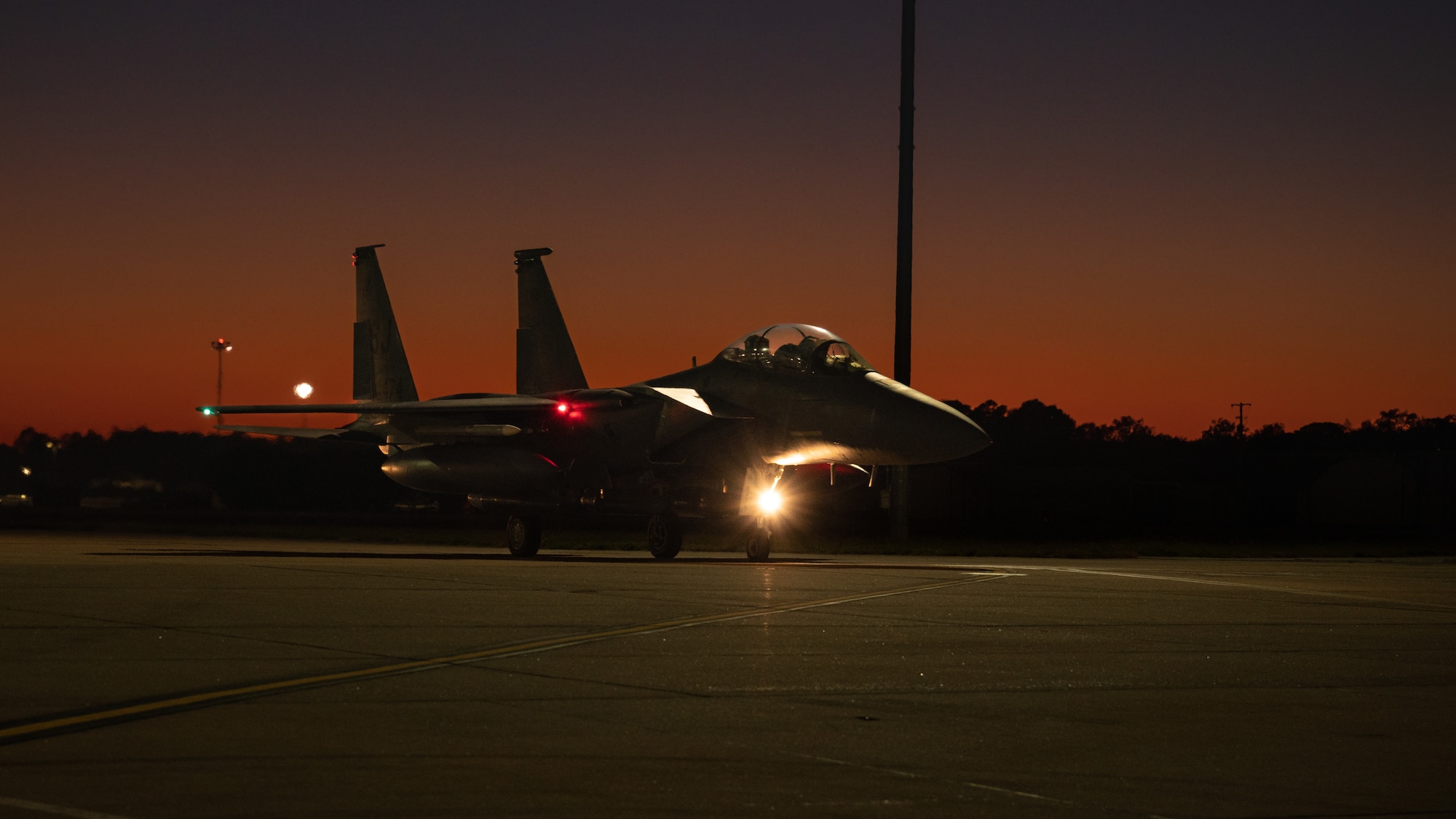 An F-15E Strike Eagle assigned to the 336th Fighter Squadron taxis during a homecoming ceremony at Seymour Johnson Air Force Base, North Carolina, Oct. 30, 2023. Airmen were deployed to the Air Force’s Central Command area of responsibility where they provided air-to-air and air-to-ground defense. (U.S. Air Force photo by Airman 1st Class Rebecca Sirimarco-Lang)