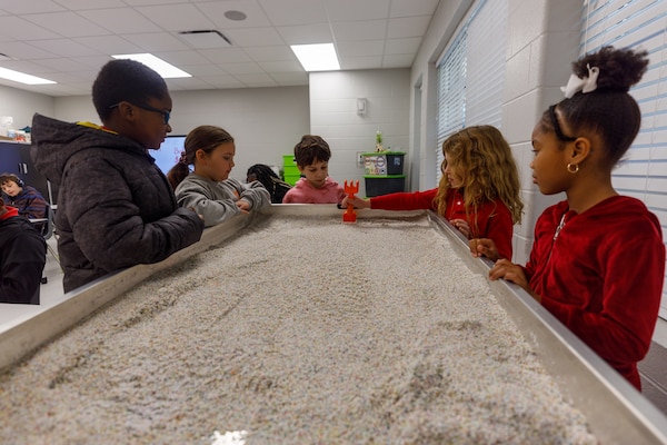 Bovina Elementary students gather around the ERDC Mobile STEM Lab to learn more about its features and resources.