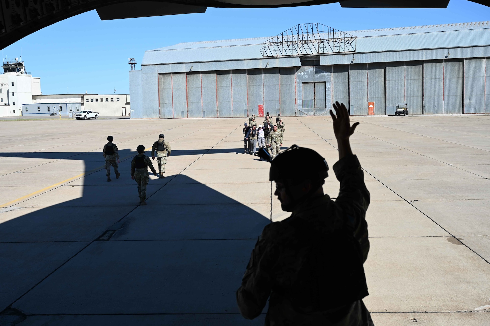 Patients are loaded onto a C-17 Globemaster III before take-off during the Caduceus Spear exercise at Clinton Sherman Airfield Park, Oklahoma, Oct. 26, 2023. Once in the air, medics were charged with keeping patients alive during unregulated patient movement. (U.S. Air Force photo by Airman 1st Class Kari Degraffenreed)