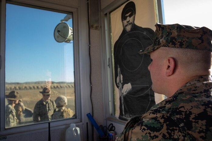 U.S. Marine Corps Lance Cpl. Hagen Taylor, range personnel with Weapons Field Training Battalion, oversees range operations during a table two course of fire at Marine Corps Base Camp Pendleton, California, Oct. 31, 2023. The table two course of fire teaches recruits the fundamentals of safety and marksmanship in combat shooting positions and rifle carries. (U.S. Marine Corps photo by Lance Cpl. Sarah M. Grawcock)