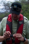 Naval Facilities Engineering Systems Command Environmentalist hunt for invasive coral off the waters of JBPHH.