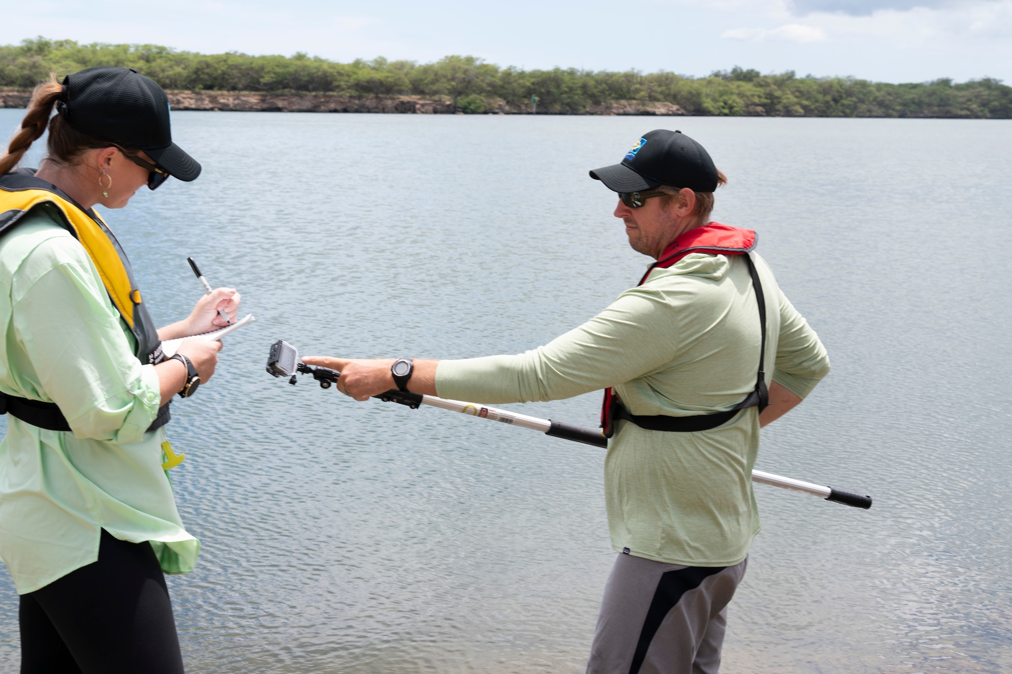 Naval Facilities Engineering Systems Command Environmentalist hunt for invasive coral off the waters of JBPHH.