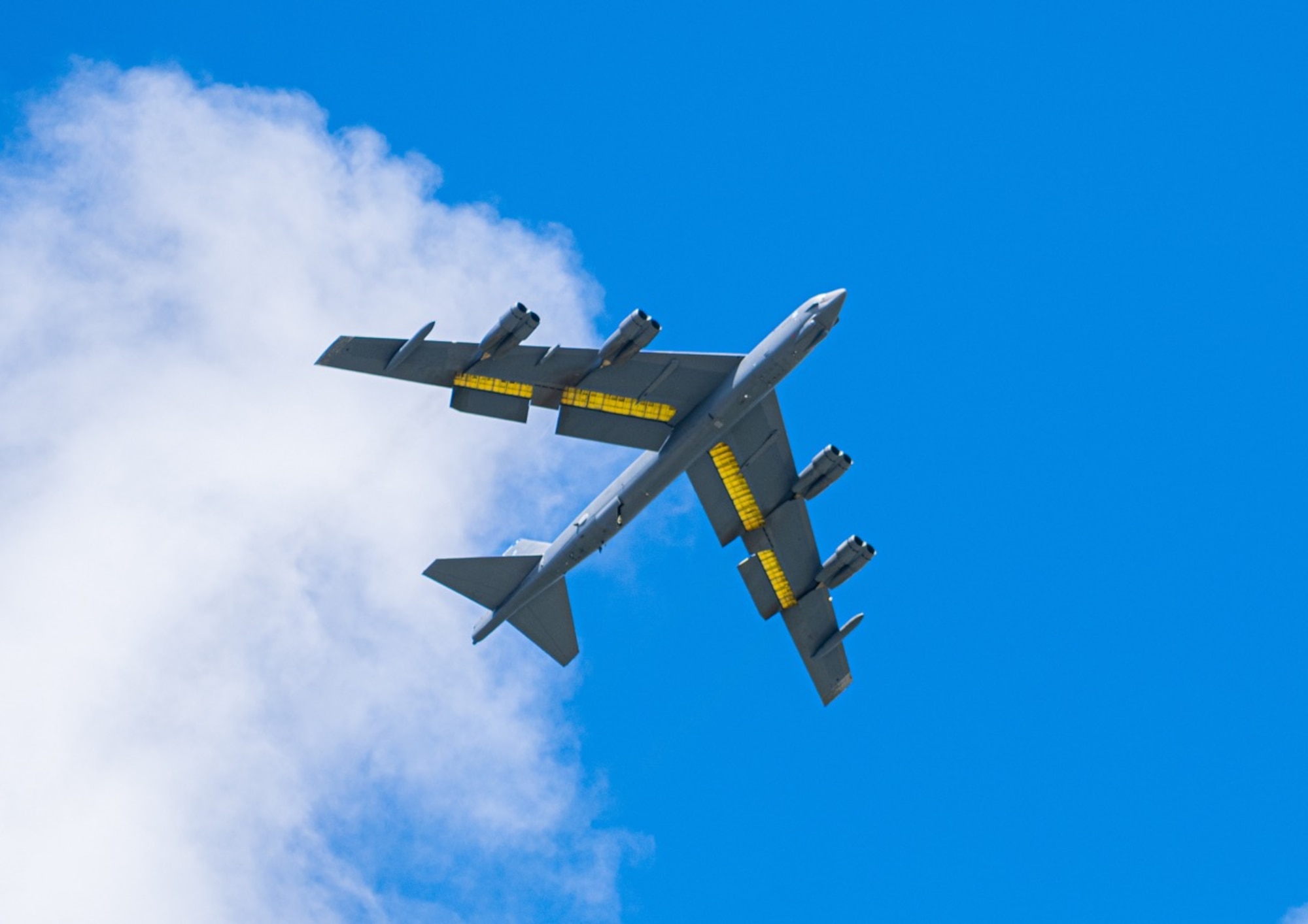 A B-52 Stratofortress assigned to the 2nd Bomb Wing at Barksdale Air Force Base, Louisiana, flies over Andersen Air Force Base, Guam, in support of a Bomber Task Force deployment, October 20, 2023. U.S. forces will fly, sail, and operate anywhere international law allows, at the time and the tempo of our choosing. (U.S. Air Force photo by 2nd Lt. Jonathan Villegas)