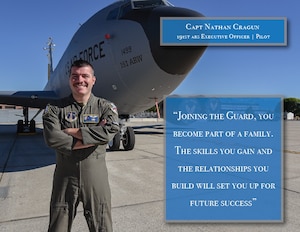 An airman poses in front of an aircraft for a photo