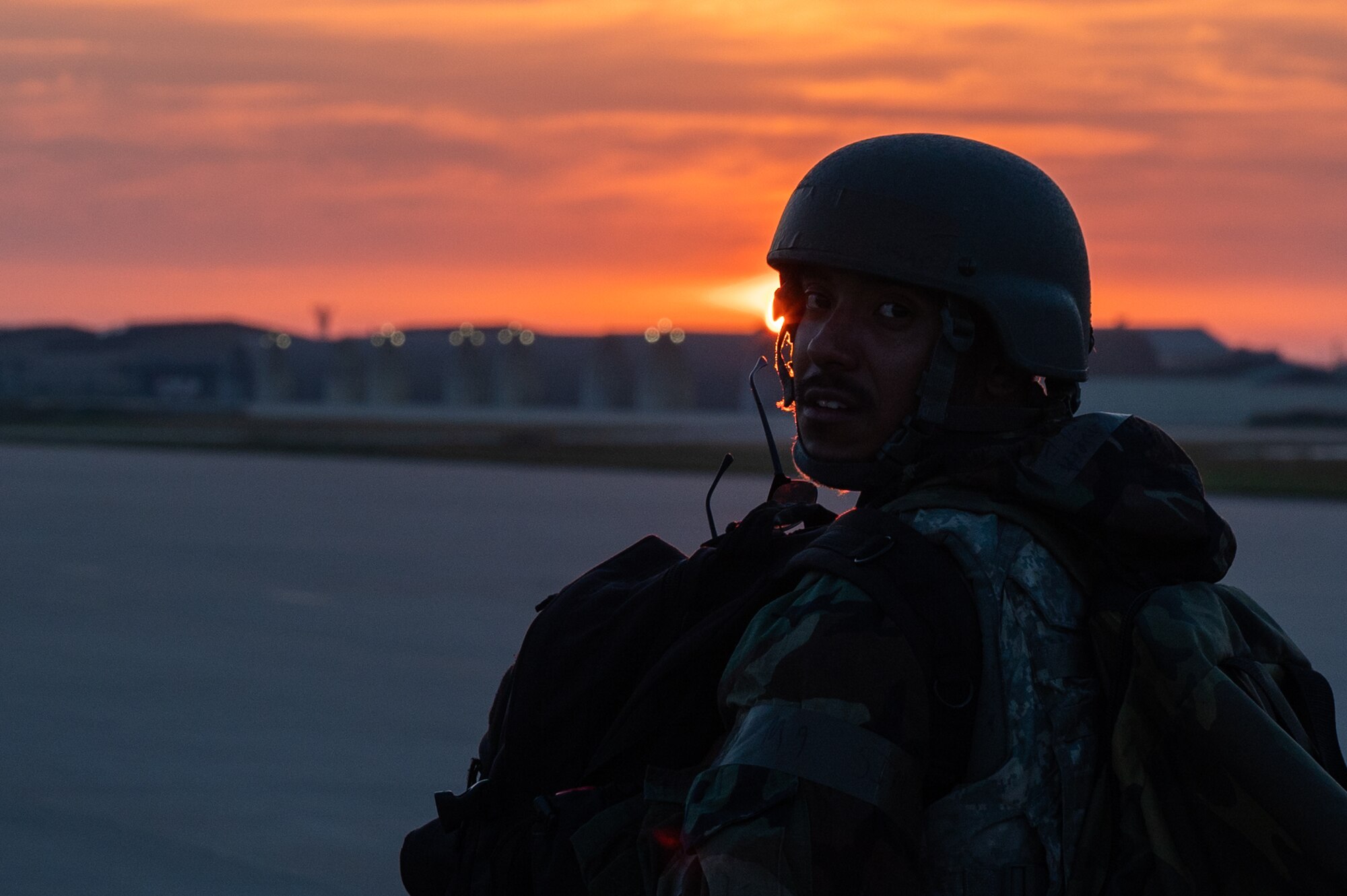 Airman First Class Alex Goodnow inspects the tail of an F-16 Fighting Falcon during preflight checks during Vigilant Defense 24.