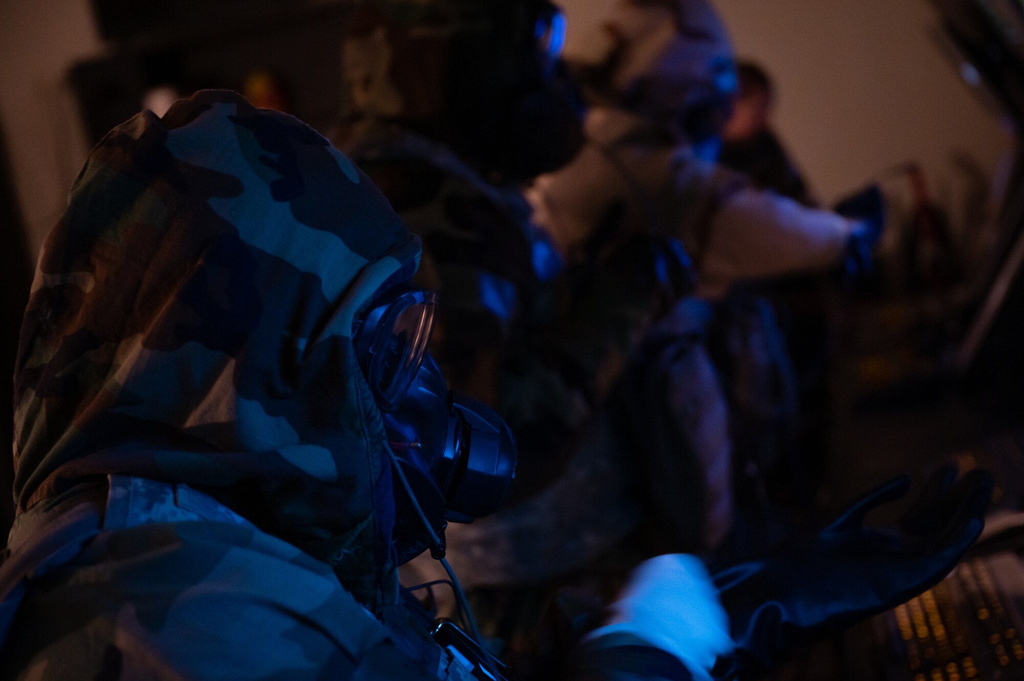 Airmen from the 8th Operations Support Squadron don their mission-oriented protective posture gear during operations as part of exercise Vigilant Defense 24.