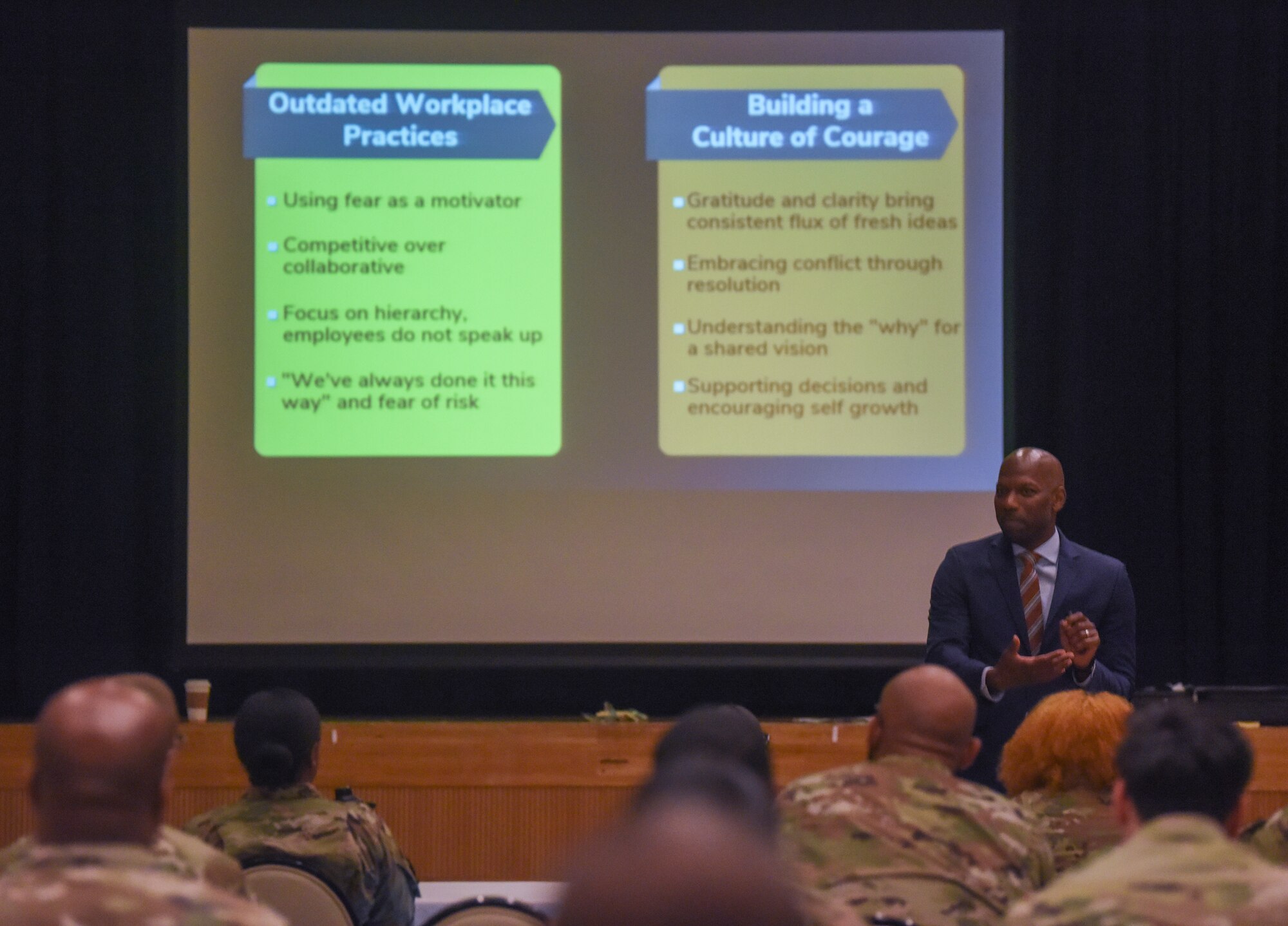 Briefer interacts with participants during a professional development seminar.