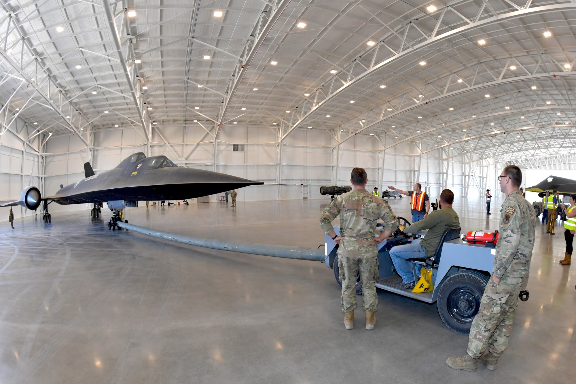 Crews relocate an SR-71 Blackbird static display inside the Hill Aerospace Museum’s new L.S. Skaggs Gallery Oct. 23, 2023, at Hill Air Force Base, Utah. Last month, a significant portion of the museum’s most modern generation aircraft were moved into the new gallery by museum staff and volunteers from organizations outside the museum. (U.S. Air Force photo by Todd Cromar)