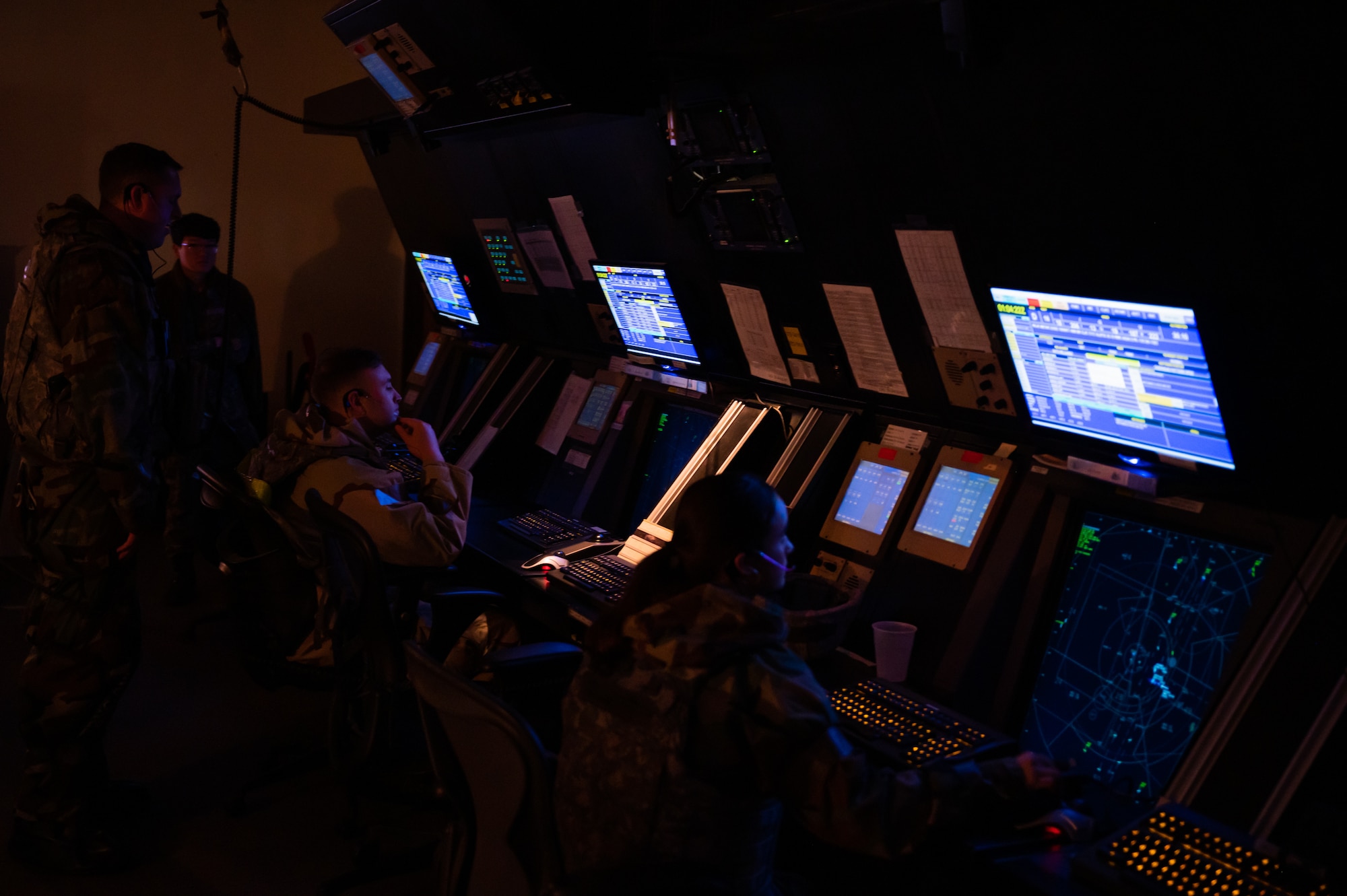 Staff Sgt. Valerie Ashlock and Senior Airman Adam Emmons check airfield radars during Vigilant Defense 24.