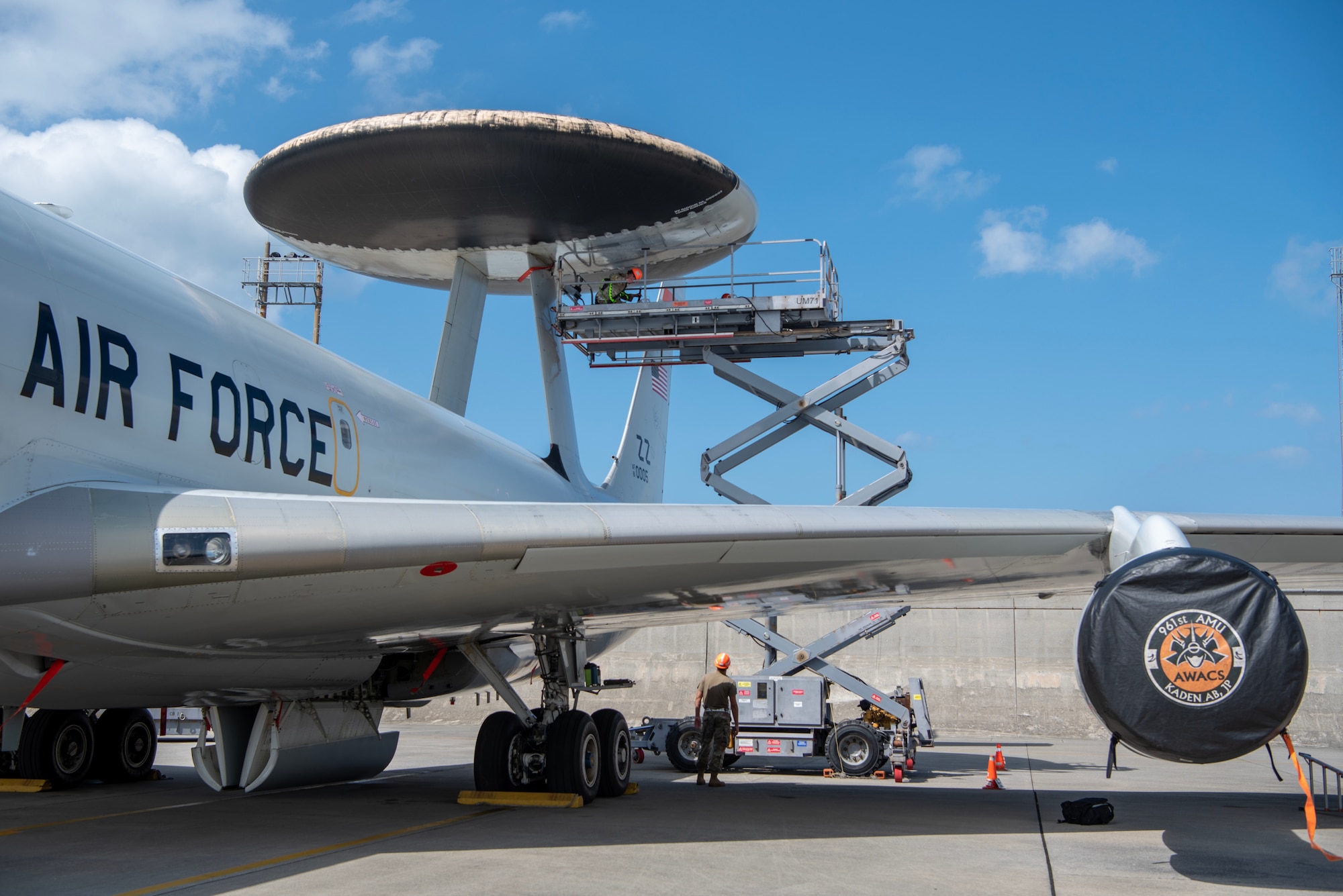 Maintenance  begins on a E-3 Sentry Airborne Warning and Control System aircraft