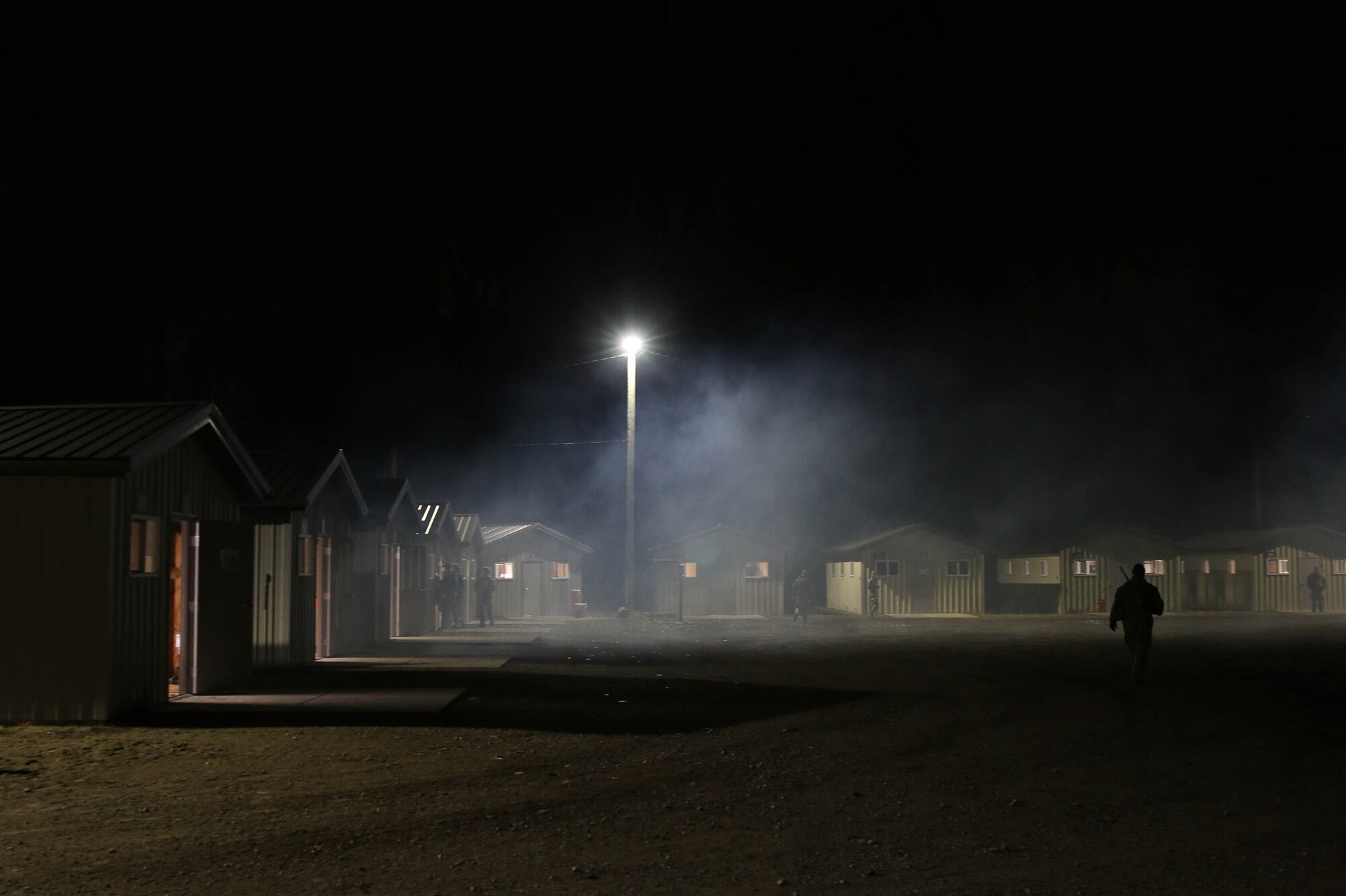 The 445th Security Forces Squadron conducted a daytime/nighttime base defense exercise at the Warfighting Training Center on Wright-Patterson Air Force Base, Ohio, Oct. 14-15, 2023. The training tested their agile combat employment (ACE) with limited resources, revealing strengths, limitations and resource requirements. Squads performed area security operations (ASO) that focused on expeditionary combat skills. They created defensive fighting positions (DFPs) with tools, sandbags and dirt to fortify the sector, and built expeditionary entry control points (EECP). Defenders established a Tactical Operations Center (TOC) to run command and control and performed Quick Response Force (QRF) patrols. The squads also engaged with noncombatants to test security protocols and observe impacts of interactions.