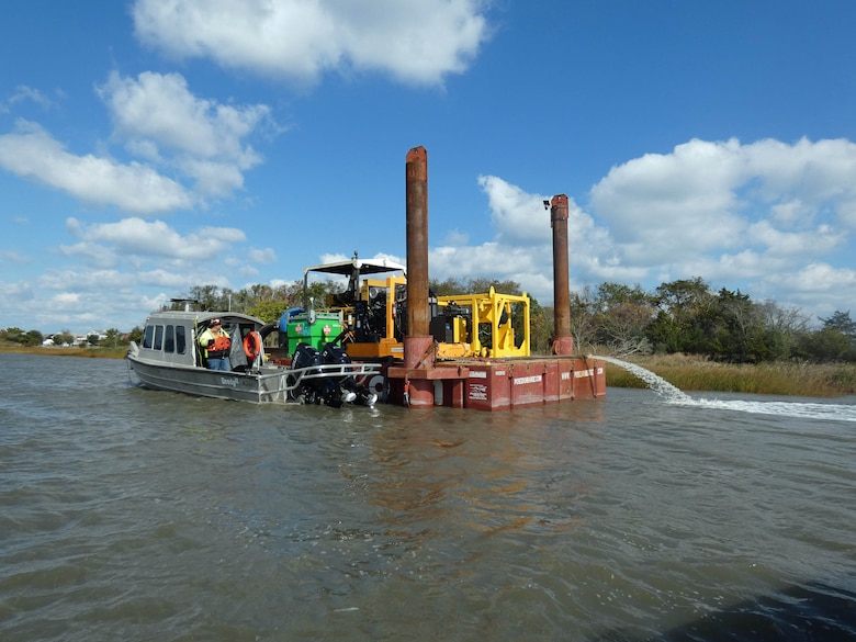 USACE’s contractor (DredgIT of Houston, TX) conducts dredging operations in the federal channel of the Lewes & Rehoboth Canal in November 2023. The federal channel hasn’t been dredged in a number of years. The waterway is used by commercial and recreational fishing charter boats, the U.S. Coast Guard, and the Delaware Bay and River Cooperative (DBRC), whose mission is oil spill emergency response/cleanup for events occurring in the Delaware River and Bay (Photo by Ed Voigt).