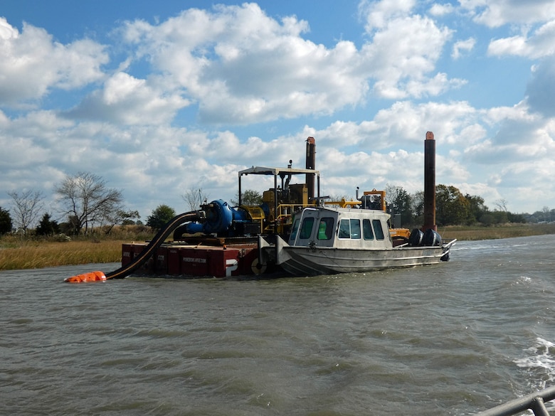 USACE’s contractor (DredgIT of Houston, TX) conducts dredging operations in the federal channel of the Lewes & Rehoboth Canal in November 2023. The federal channel hasn’t been dredged in a number of years. The waterway is used by commercial and recreational fishing charter boats, the U.S. Coast Guard, and the Delaware Bay and River Cooperative (DBRC), whose mission is oil spill emergency response/cleanup for events occurring in the Delaware River and Bay (Photo by Ed Voigt).