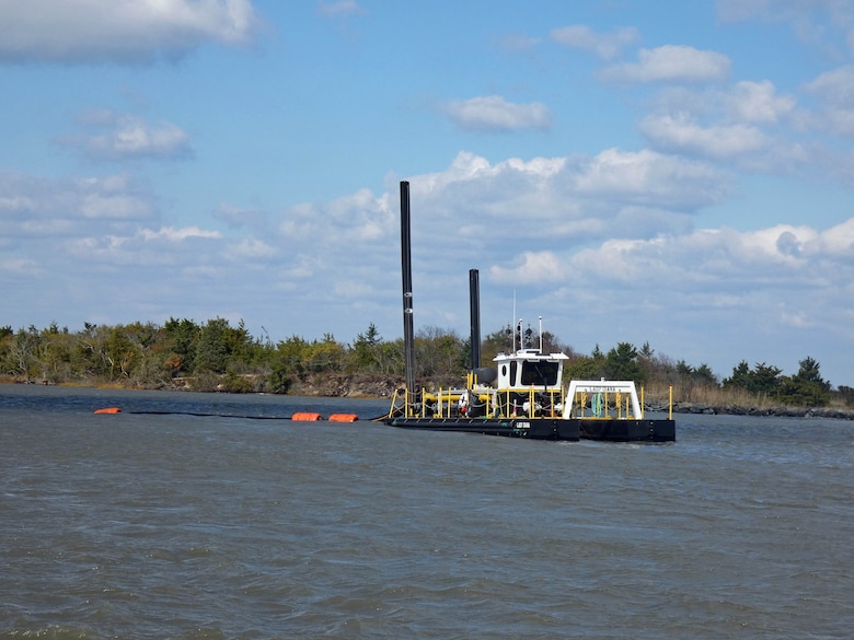 USACE’s contractor (DredgIT of Houston, TX) conducts dredging operations in the federal channel of the Lewes & Rehoboth Canal in November 2023. The federal channel hasn’t been dredged in a number of years. The waterway is used by commercial and recreational fishing charter boats, the U.S. Coast Guard, and the Delaware Bay and River Cooperative (DBRC), whose mission is oil spill emergency response/cleanup for events occurring in the Delaware River and Bay (Photo by Ed Voigt).